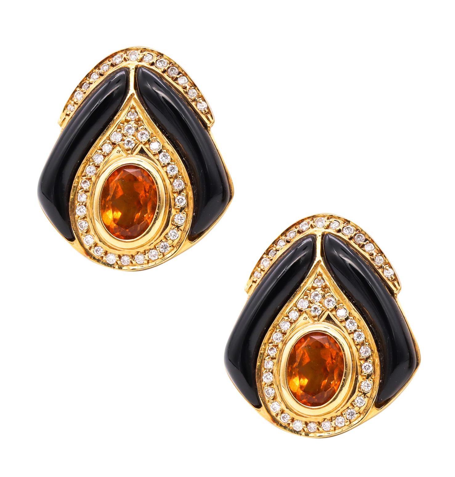Pair of Gem Set Italian Earrings.

Beautiful designer's Post-modernist trillion shaped pair, crafted in Italy in solid yellow gold of 18 karats, with high polished finish. They are suited, with posts (Removable) for pierced ears and a pair of
