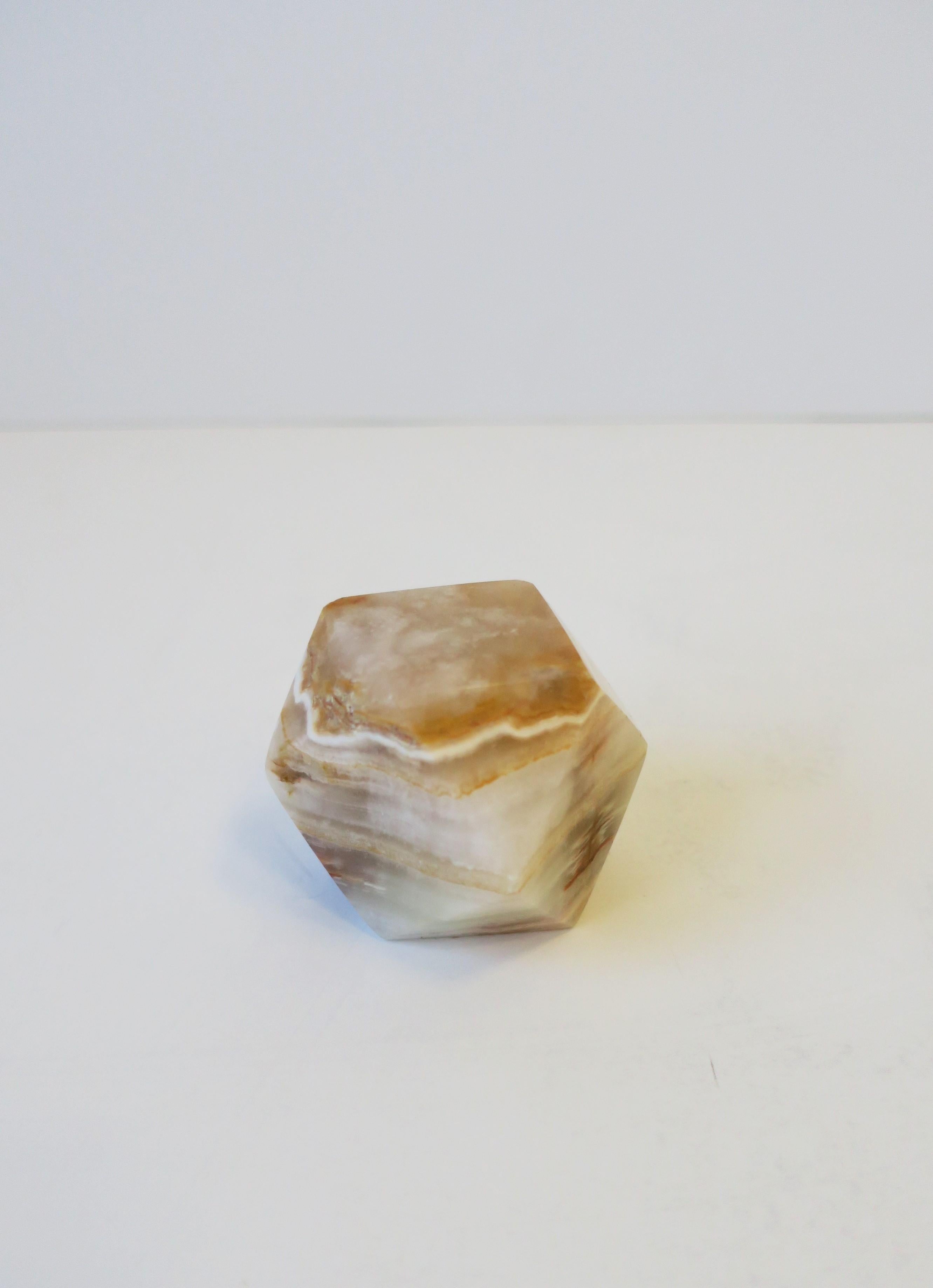 A chic 1970s modern Italian geometric onyx marble desk paperweight or decorative object sculpture piece, circa 1970s, Italy. Piece is multicolored in white and neutral hues. A great piece for a desk, table, credenza, etc. Dimensions: 2