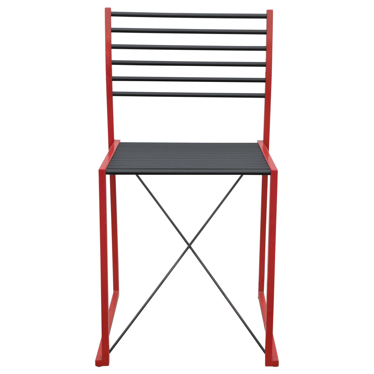 Set of 6 metal ladder back coral colored dining chairs with black seats and backs. The chairs are done in a modern Italian style and are in a minimal style.