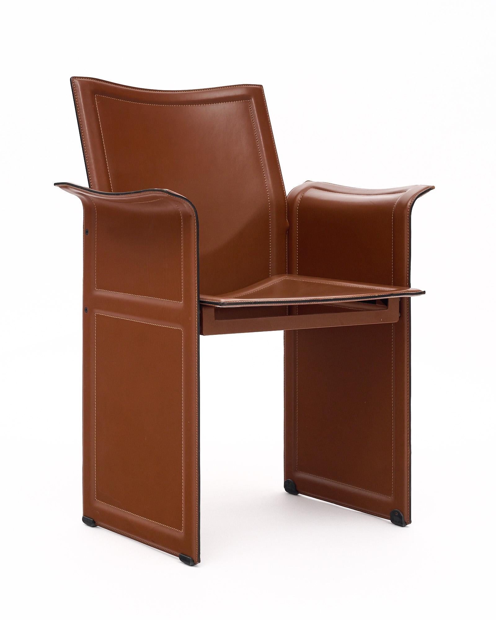 Set of 10 Modern brown leather vintage dining armchairs by Tito Agnoli for Matteo Grassi. They are made with metal frames and completely covered in a stitched brown leather in exceptional condition. This large set has superb stitching throughout and