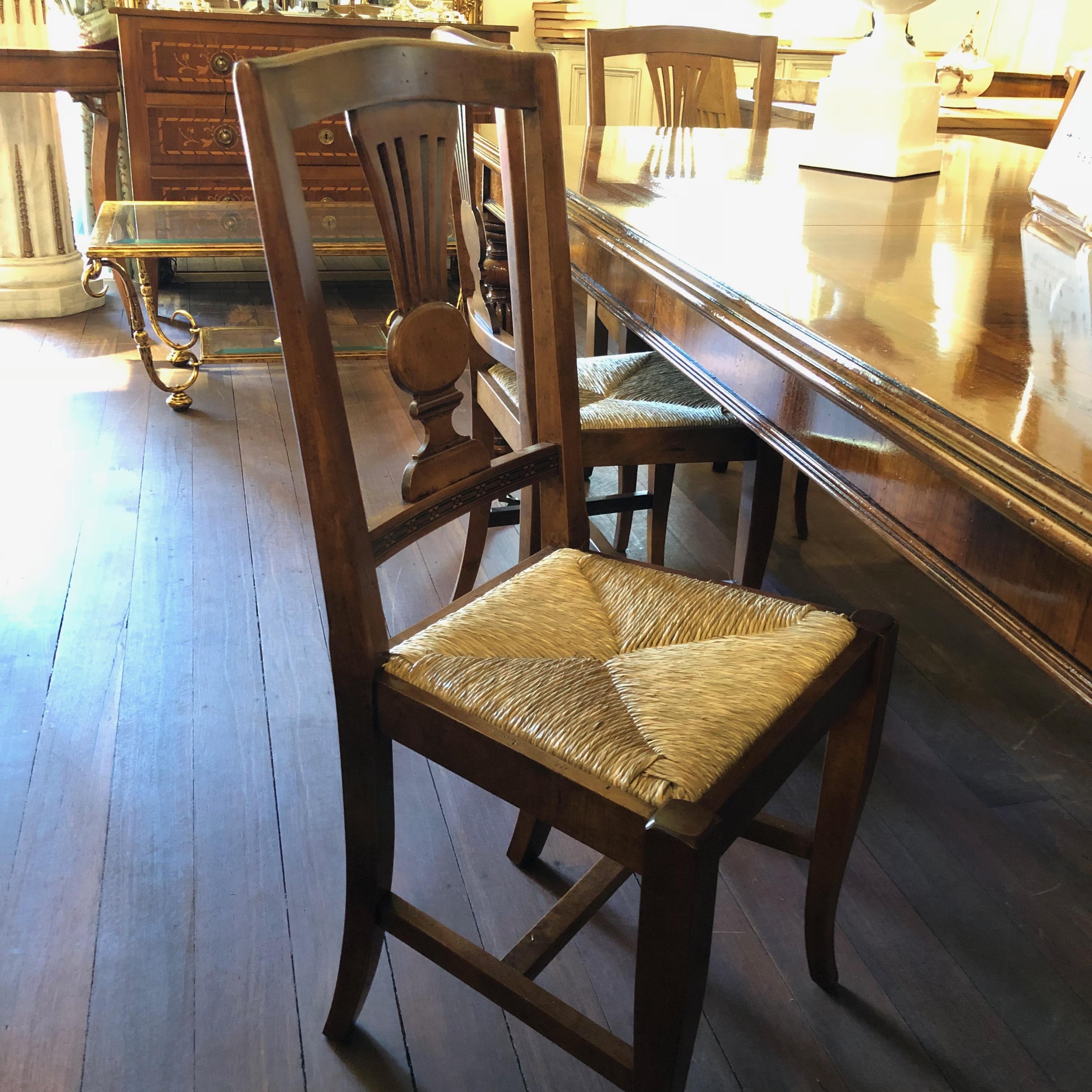 One of the most elegant features of these beautiful handcrafted Italian chairs, is their carved Lyre Back design. They feature a polished Italian walnut frame and rush seating, complete with ever so slighted curved legs. Exceptional examples of