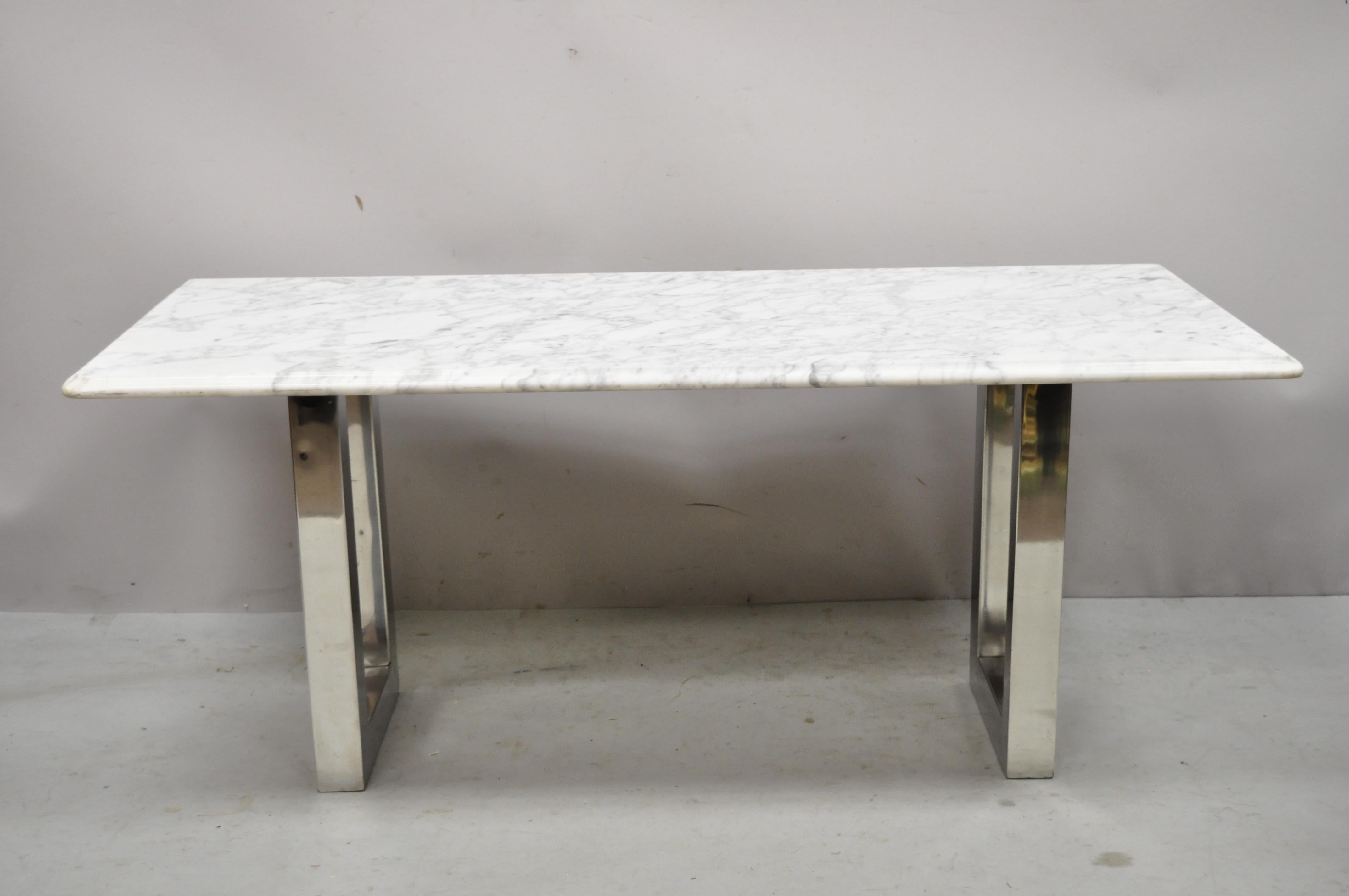 Modern Italian marble chrome double pedestal base rectangular coffee table. Item features Italian marble top, chrome double pedestal, clean modernist lines, great style and form. Circa Late 20th - Early 21st century. Measurements: 19