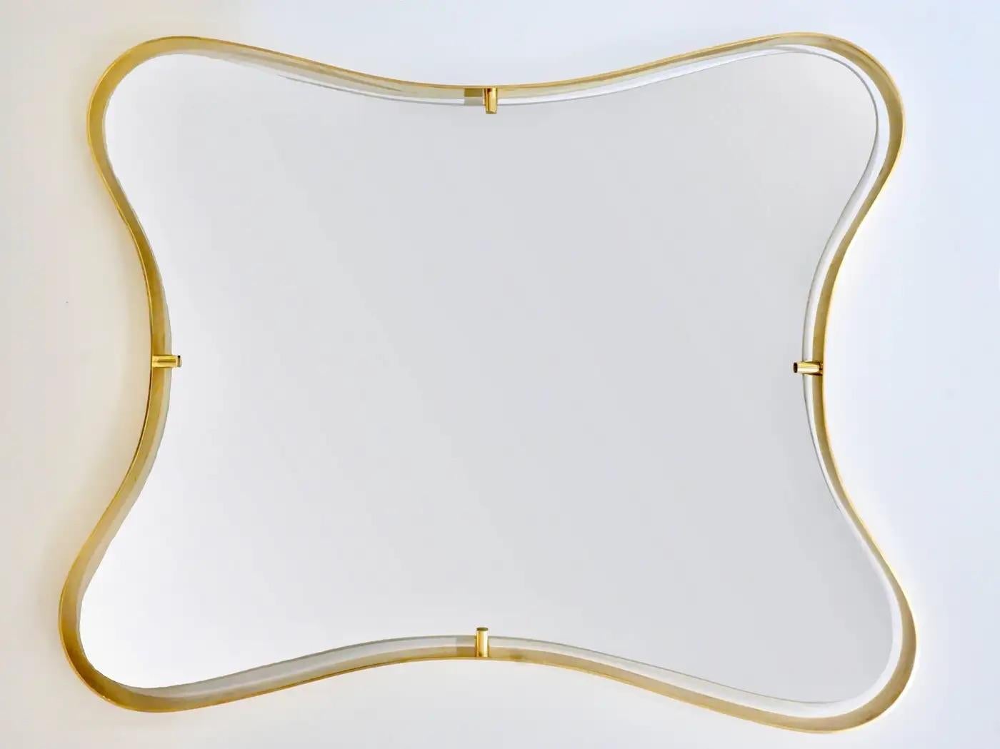 Metal Modern Italian Minimalist Brass Mirror with Organic Asymmetric Curved Frame For Sale