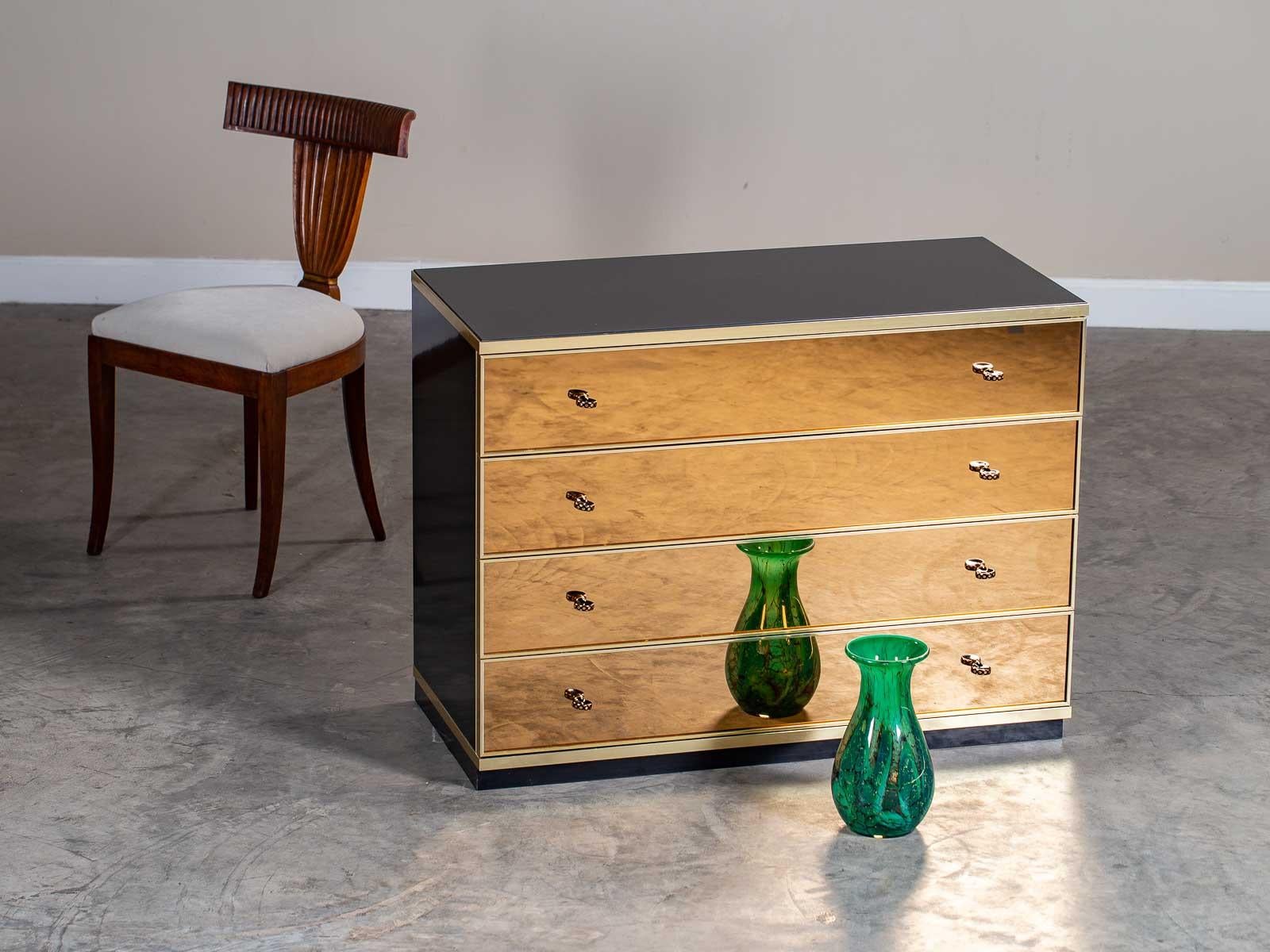 A modern Italian mirror chest of drawers from Italy circa 1975. The cool contemporary appearance of this vintage Italian mirror chest is terrific. As the top, sides and fronts of all three drawers are faced with mirror the entire chest is totally