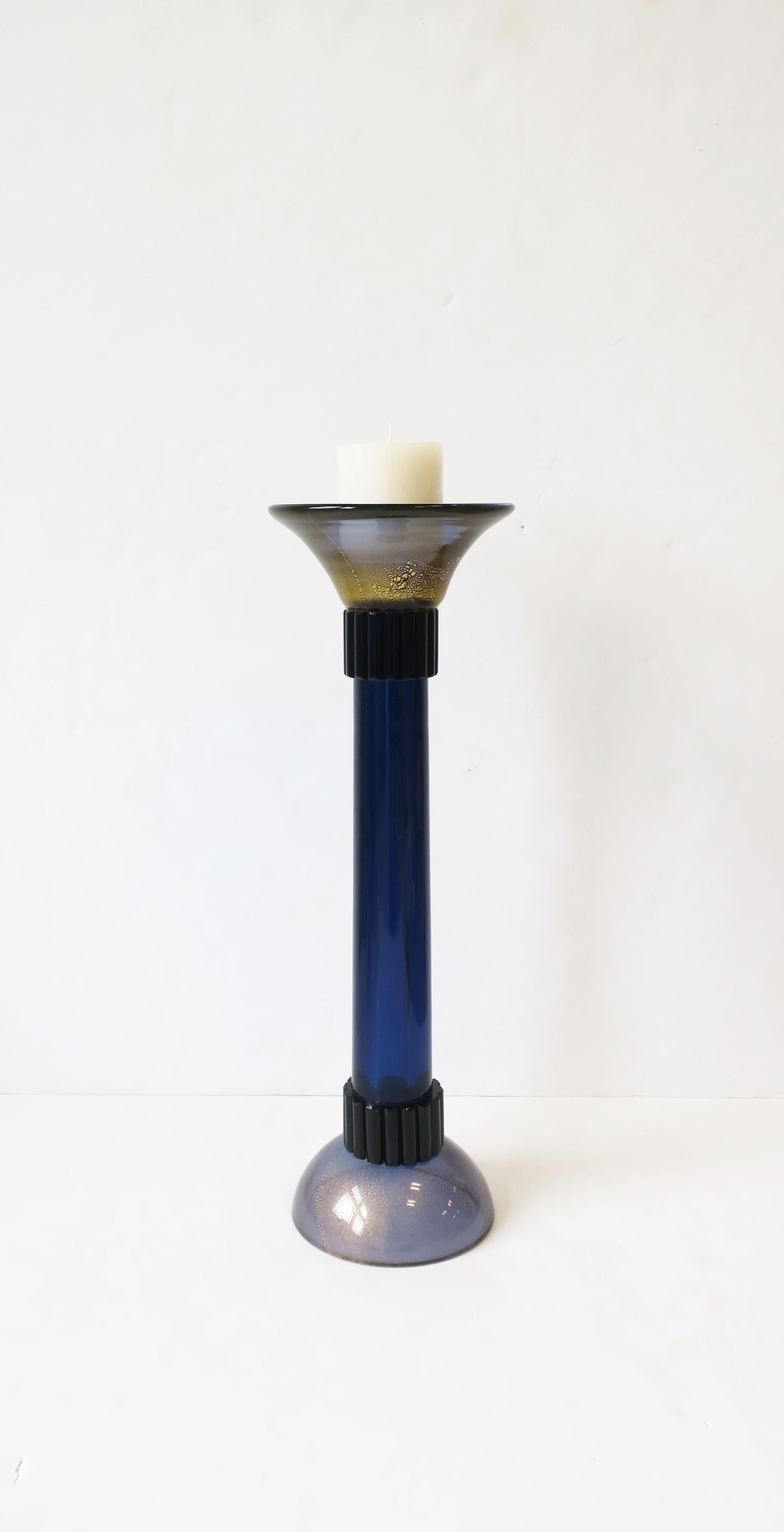 A substantial Modern Italian Murano 'torchiere' art glass candlestick holder, relatively large, made in Italy by Cenedese Vetri, circa late 20th century. A beautiful Modern style statement piece comprised of blue art glass and shimmering gold
