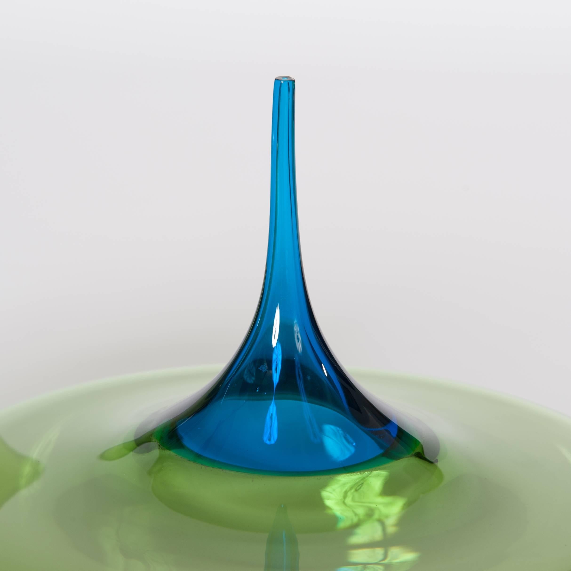 Modern Italian pair of grazile green or blue Muranoglass vases signed by Paolo Crepax.
The transparent glass objects made out of very thin glass layers shaped like drops (Goccia Technique)
Sizes:
Diameter 26 cm x Height 37 cm
Diameter 28 cm x Height