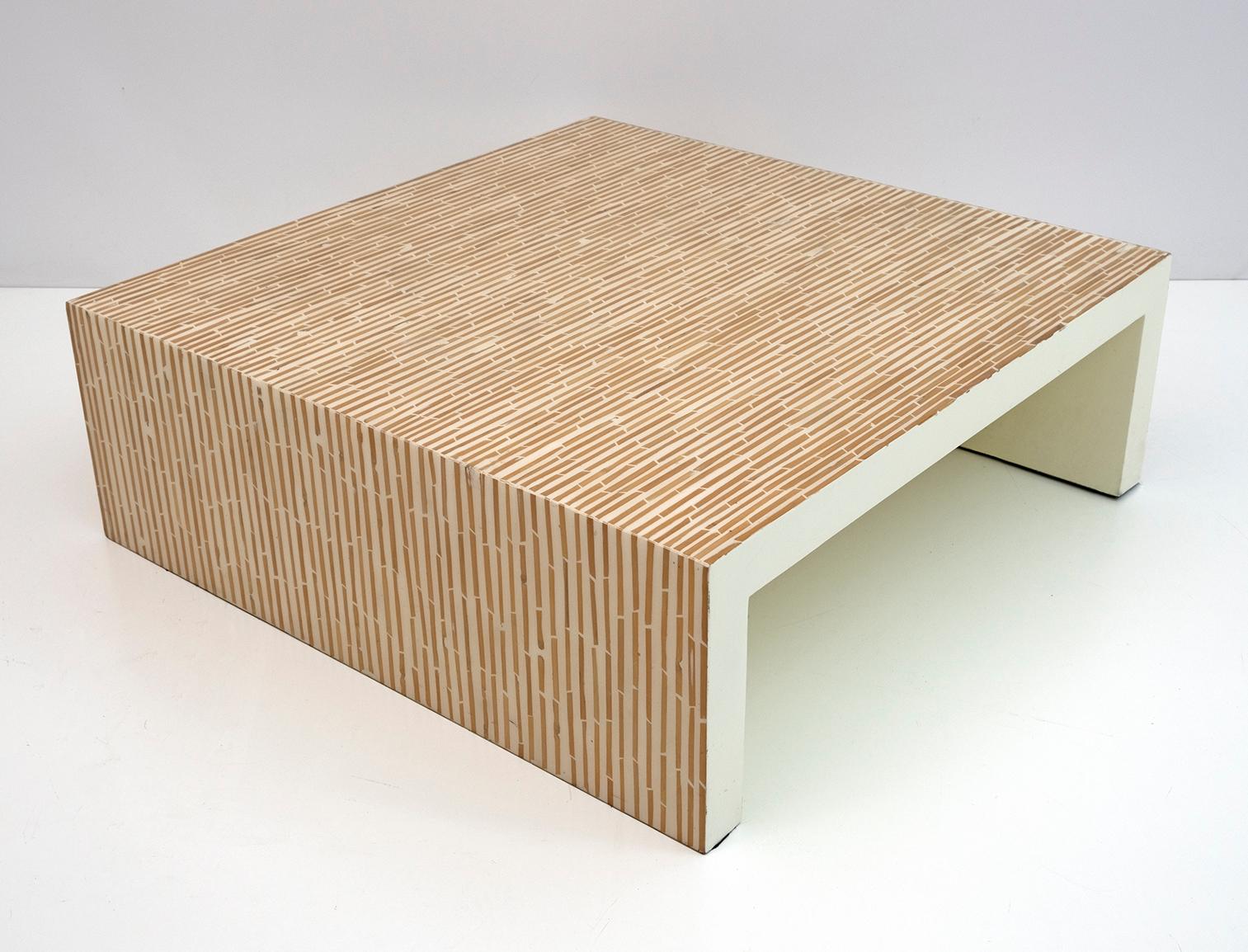 Modern coffee table, unique fusion of modern and natural elements. Each piece of natural bamboo is carefully embedded in the resin, which is white to create a sleek and modern aesthetic.