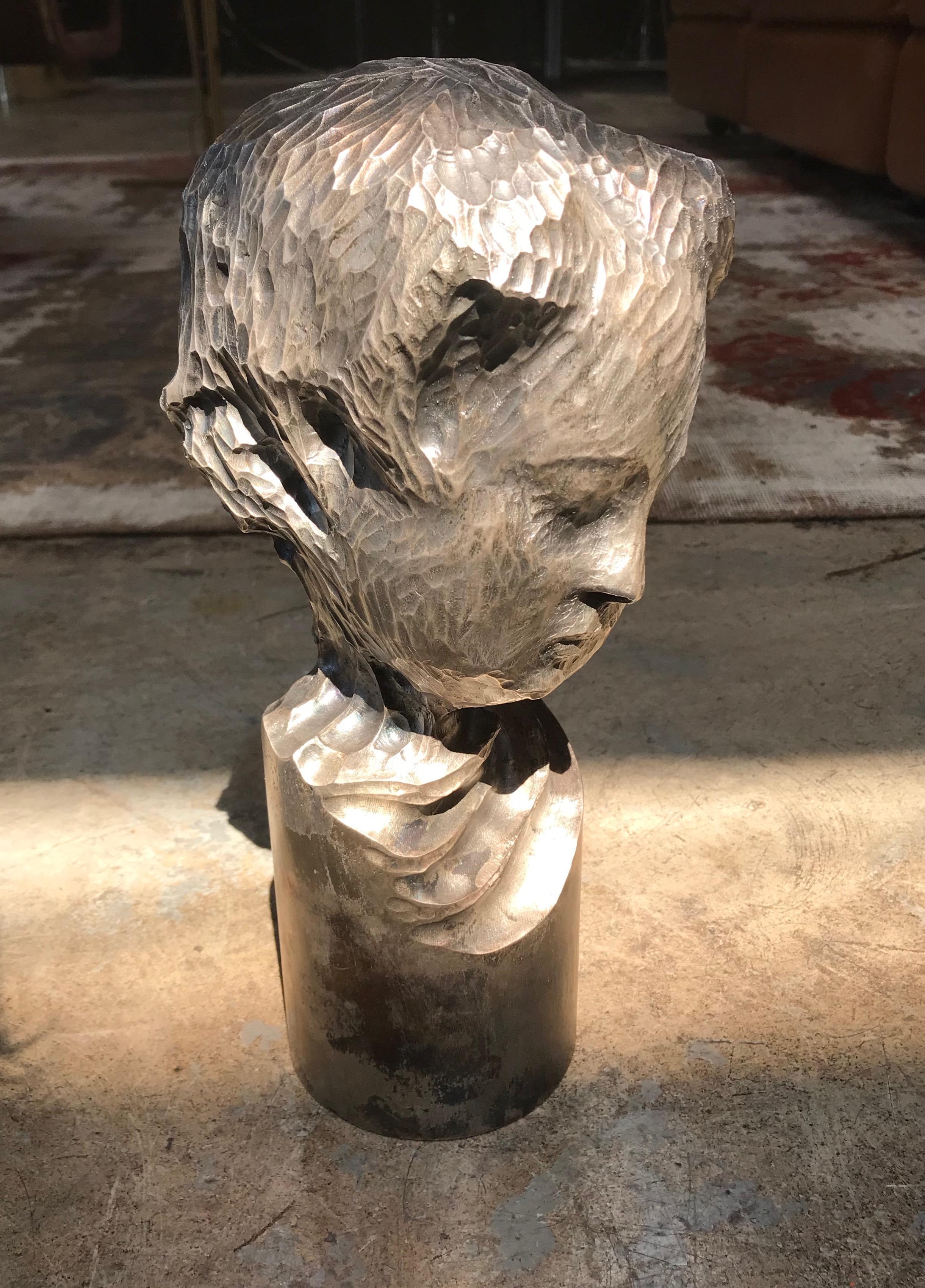 An exceptional, fine and impressive Italian sculpture sterling silver child portrait, 1970s.