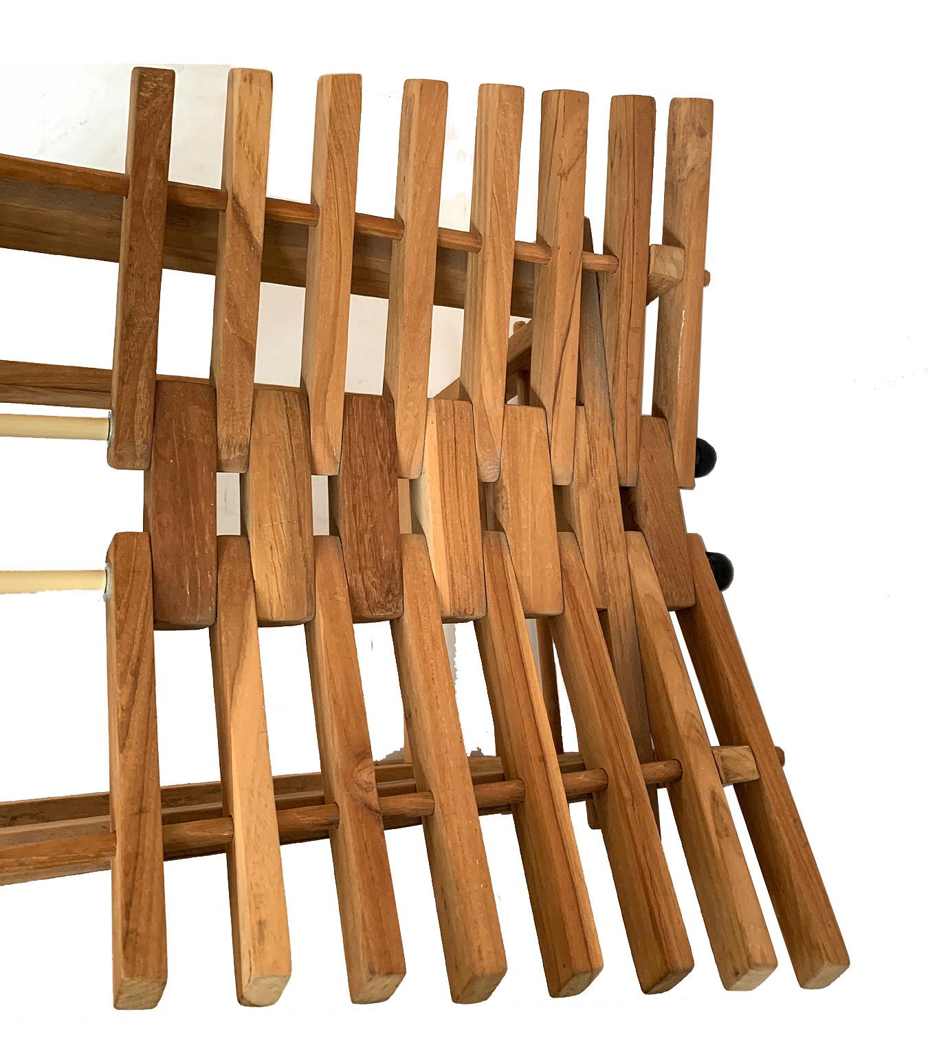 Designed by the Italian artist Anacleto Spazzapan these tall modern beechwood chairs have a detailed sculptural appearance. The tall ladder back is reminiscent of the designs of the Scottish designer Charles Rennie MacIntosh. They are very