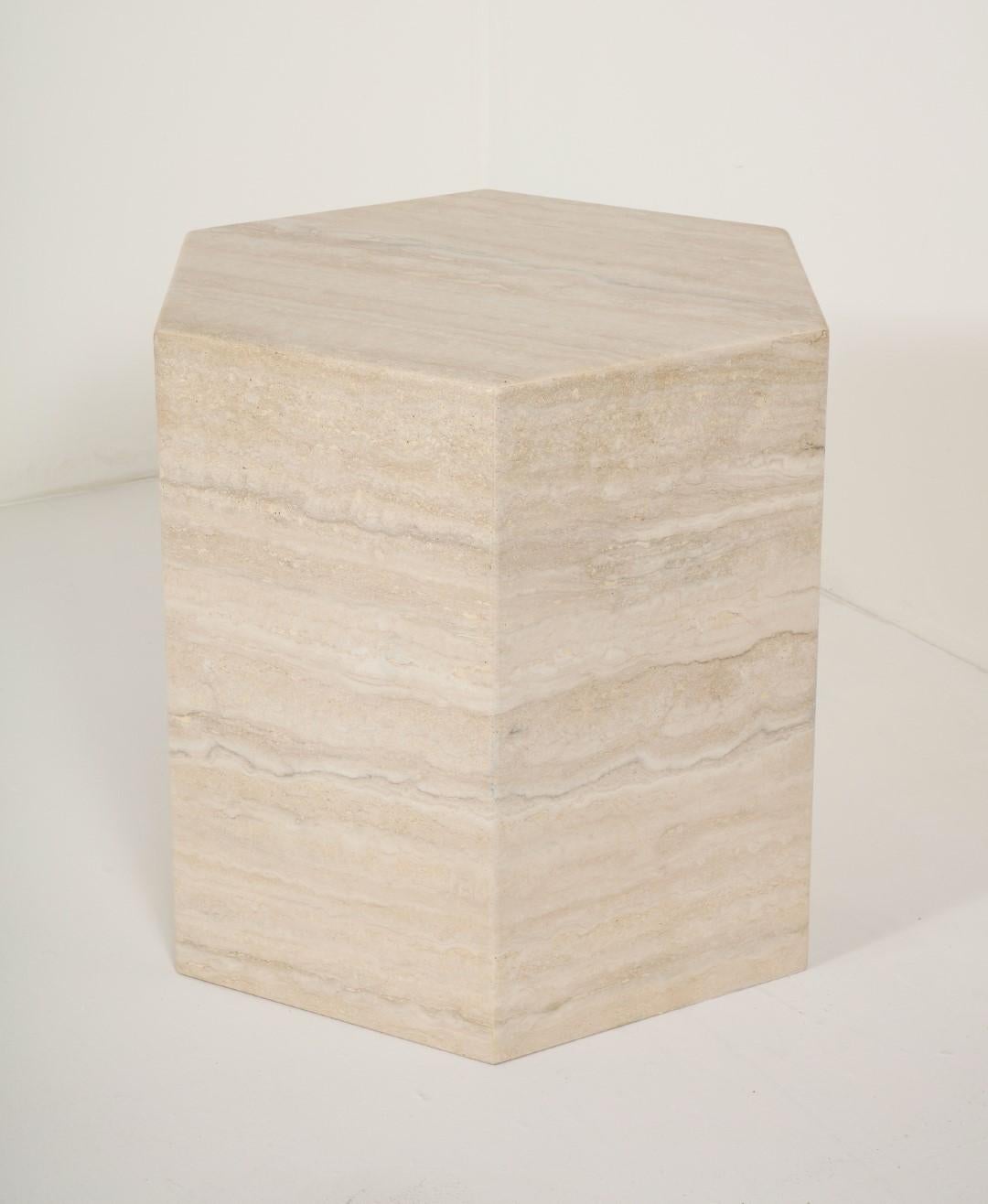 Solid Italian travertine marble hexagonal side table or pedestal. Can also be set horizontally for a coffee table. The polished travertine is beige and cream colored with beautiful variations.