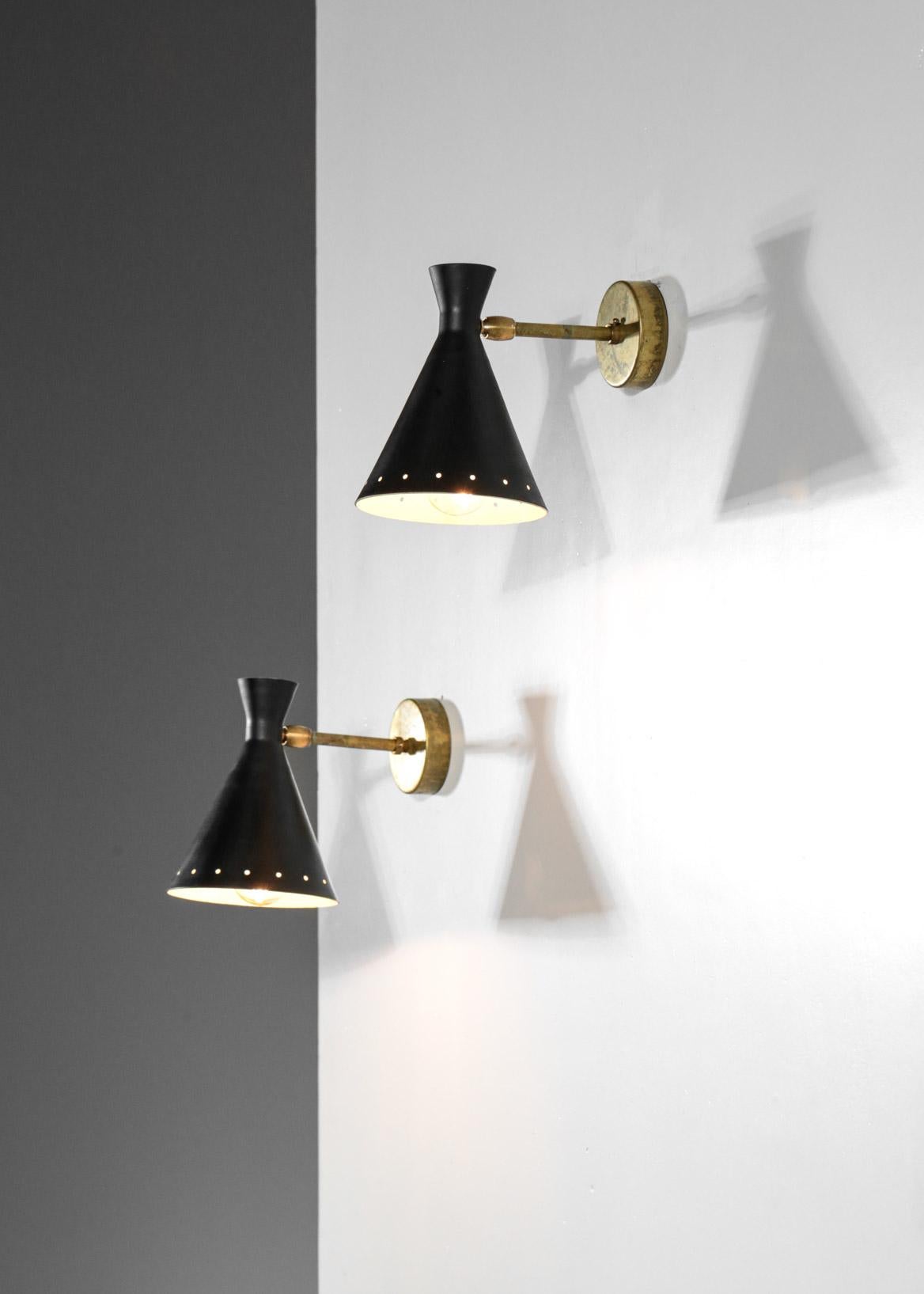 Pair of modern Italian wall lights. Also, could be used as a bedside sconces. Made with brass and painted sheet metal. Lampshade are adjustable and can light in different directions. Customers can choose color and finish brass.