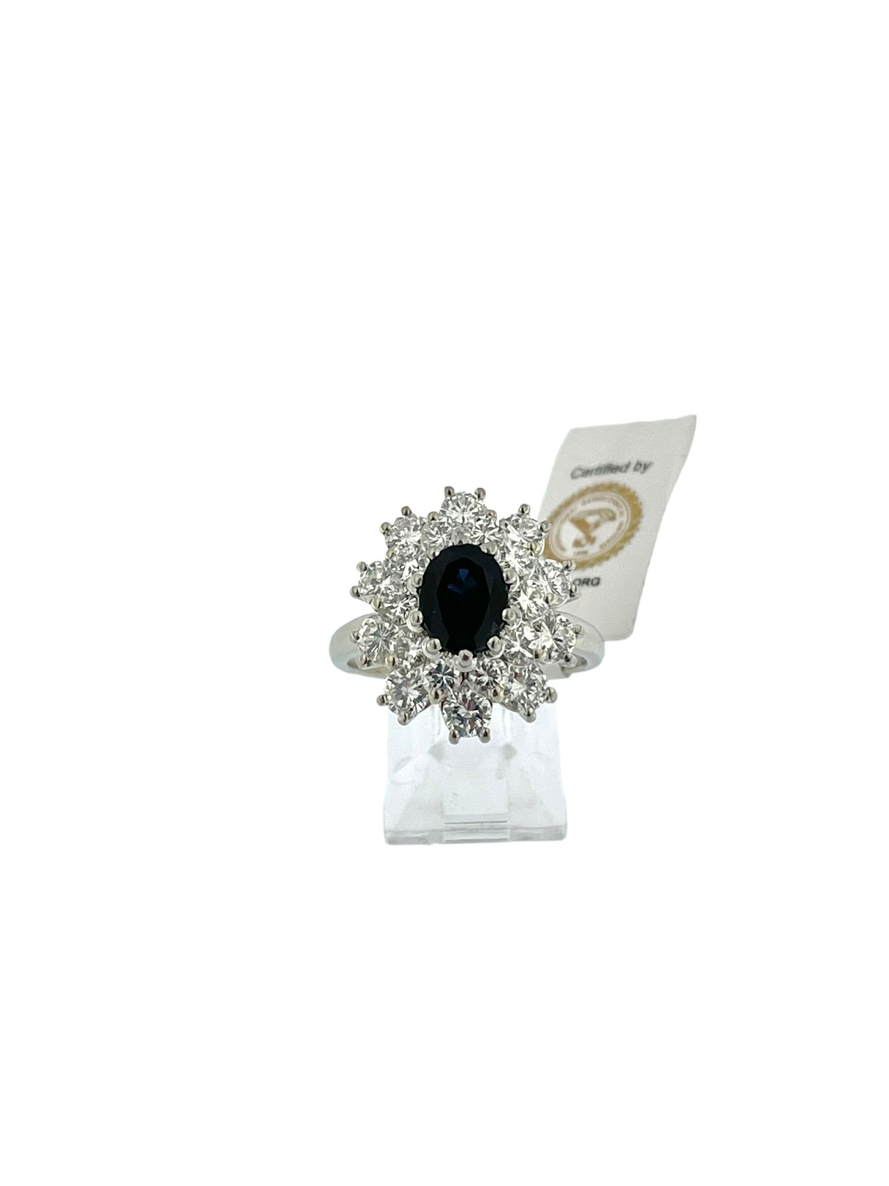 The Modern Italian White Gold Cocktail Ring with Sapphire and Diamonds is a stunning piece that showcases contemporary elegance and superb craftsmanship. This ring, crafted from luxurious 18kt white gold, features a sophisticated design that is both