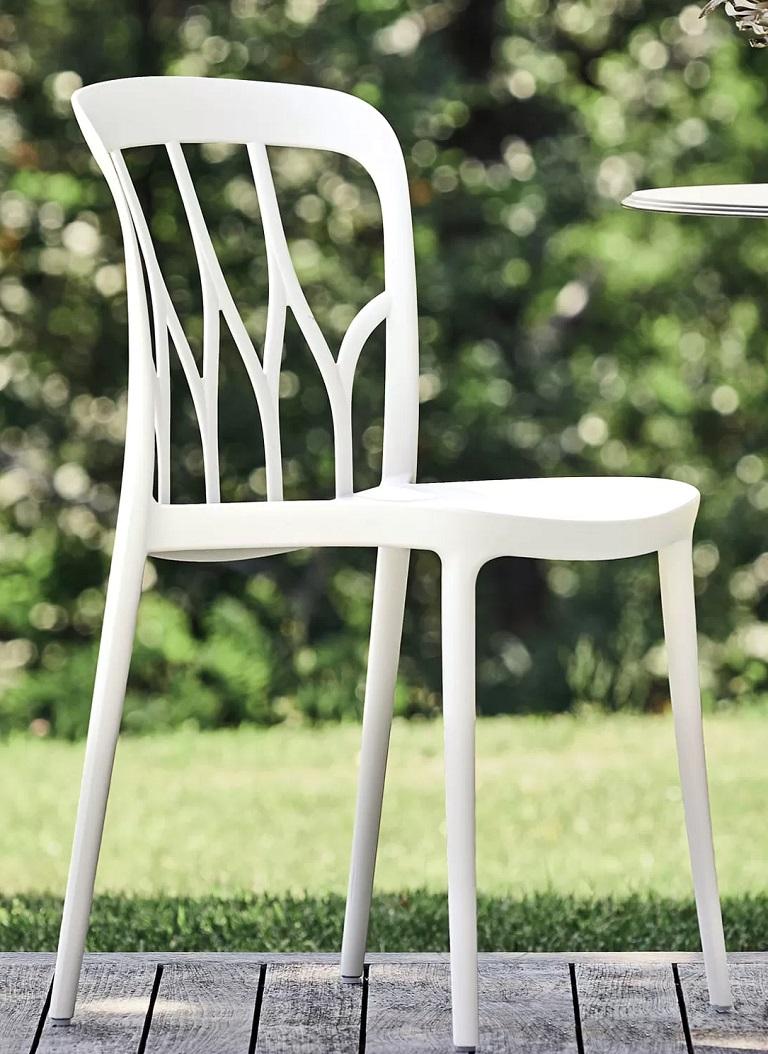 This white polypropylene chair is stackable and suitable for indoor and outdoor use. Designed by Pocci&Dondoli, galaxy is aesthetics, strength and functionality. The graphic decoration of the back gives the seat a lively and stylish soul. Galaxy