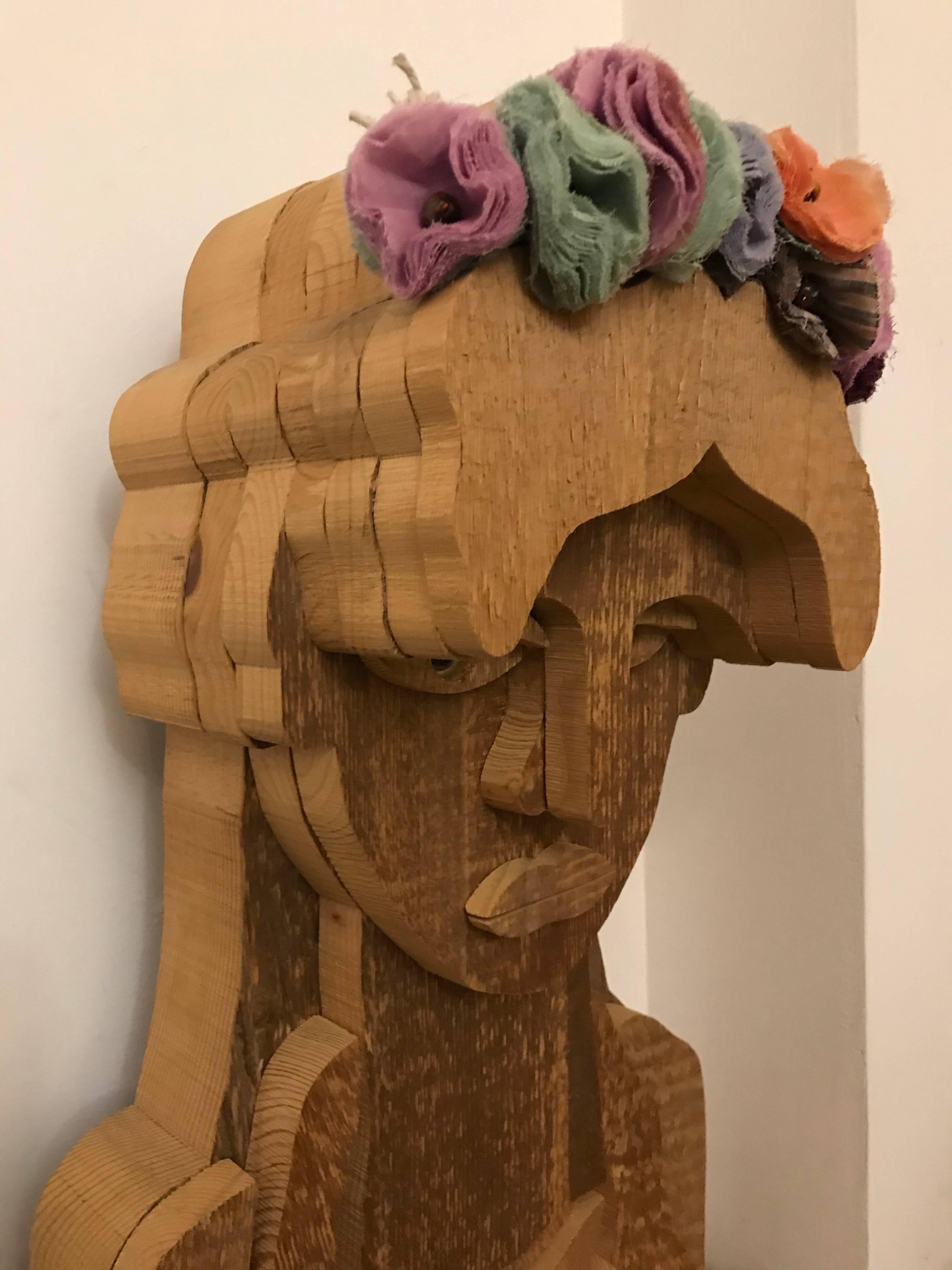 Enchanting sculpture by Michelangeli. This sculpture takes inspiration from a roman woman decorated with fabric flowers. Made in seasoned solid fir wood. This ageing technique of the fir, distinctive of the Bottega G. Michelangeli, take place