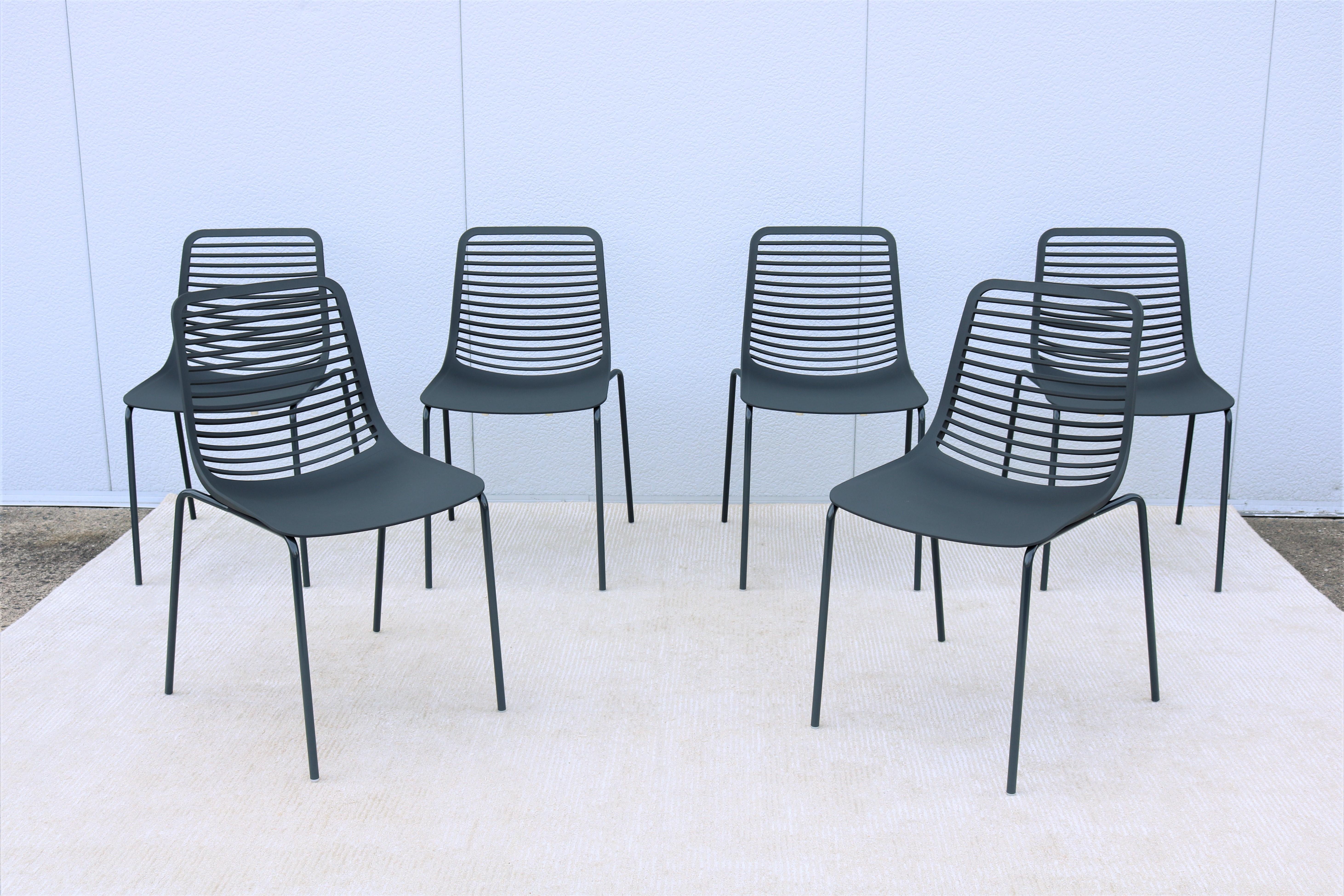 The Mini stacking chair by Parri is very sleek with a clean contemporary look.
Features distinctive style in a contoured silhouette for added comfort. 
The shape of the seat shell provides great freedom of movement in a variety of sitting