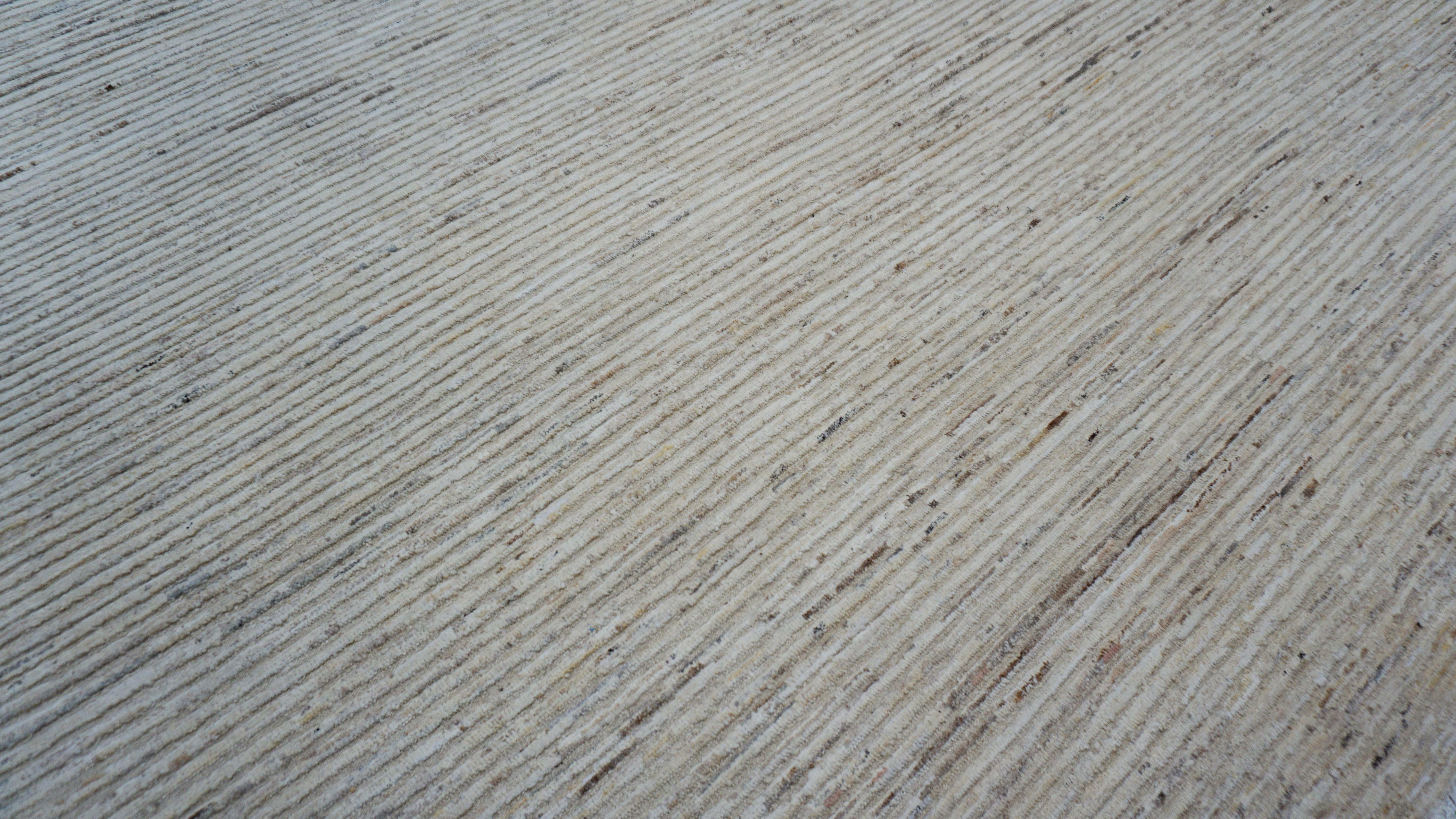 Pakistani Modern Ivory and Earth Tones Textured High Low Wool Rug 9'x12'2'' For Sale