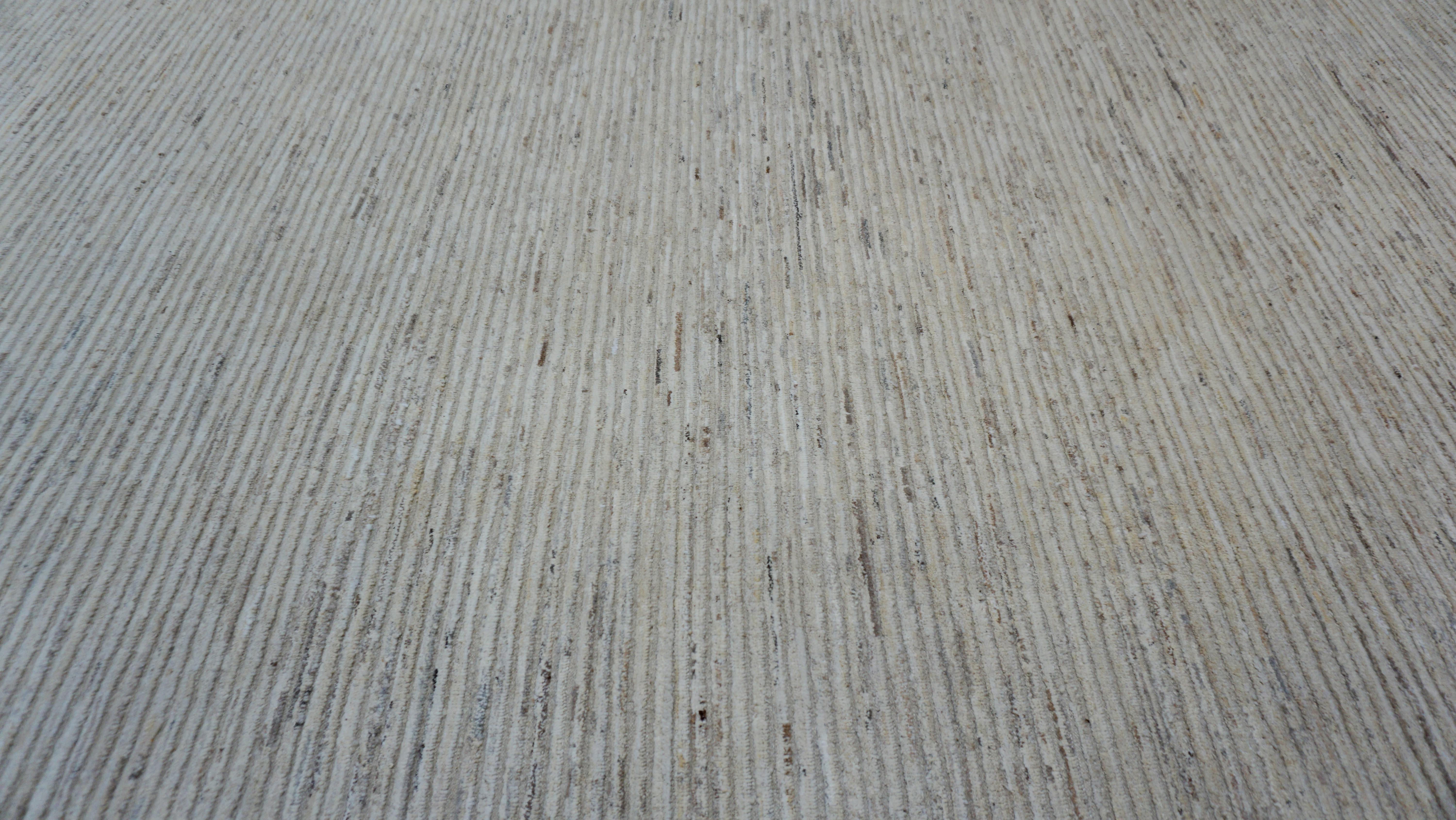 Hand-Knotted Modern Ivory and Earth Tones Textured High Low Wool Rug 9'x12'2'' For Sale