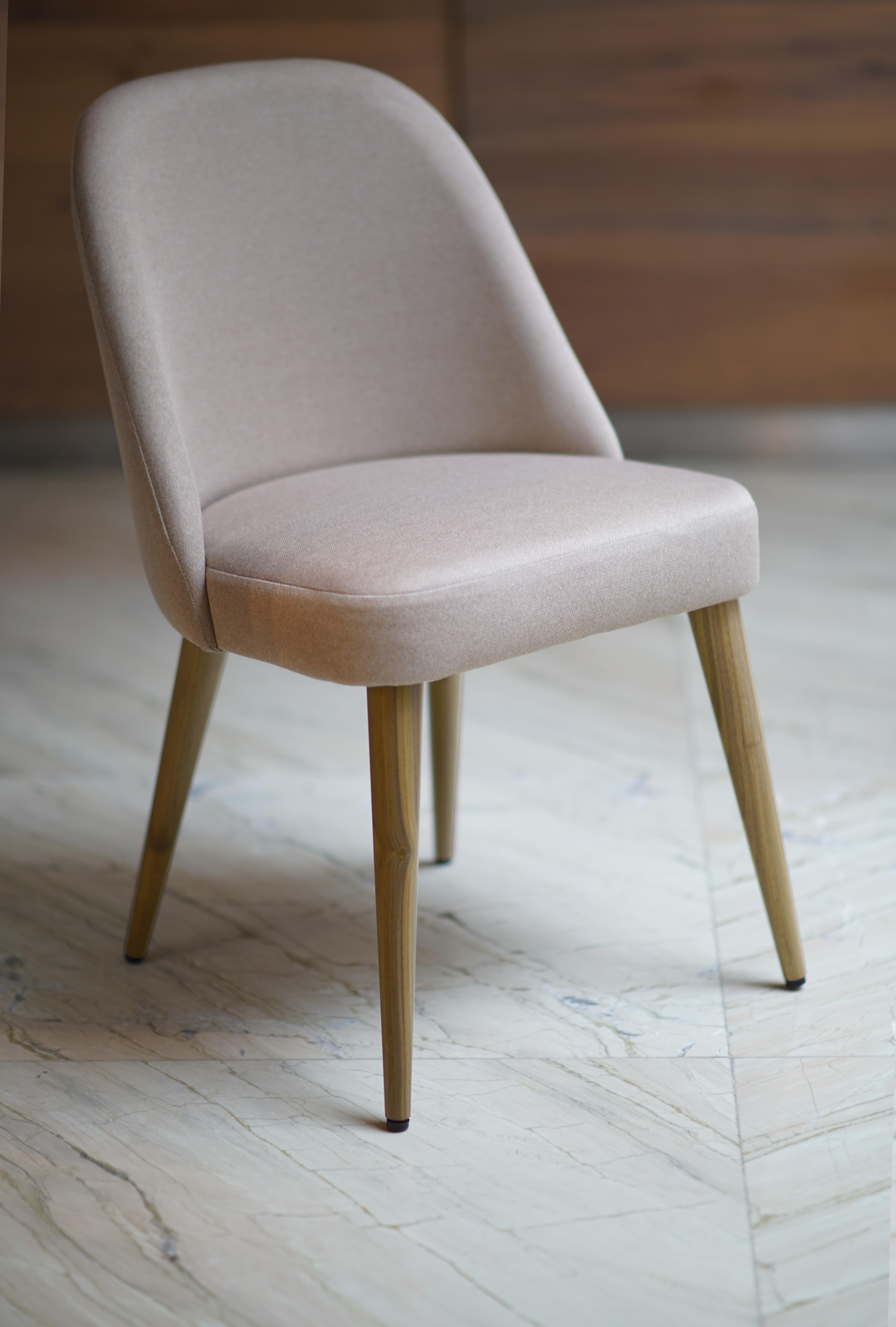Helsinki collection. Helsinki chair: simple, elegant, comfortable. Available in oak and walnut base or in custom materials, may be upholstered with variety of fabrics and colors. Also available as an arm chair and stool. 

Our clients´ favorite