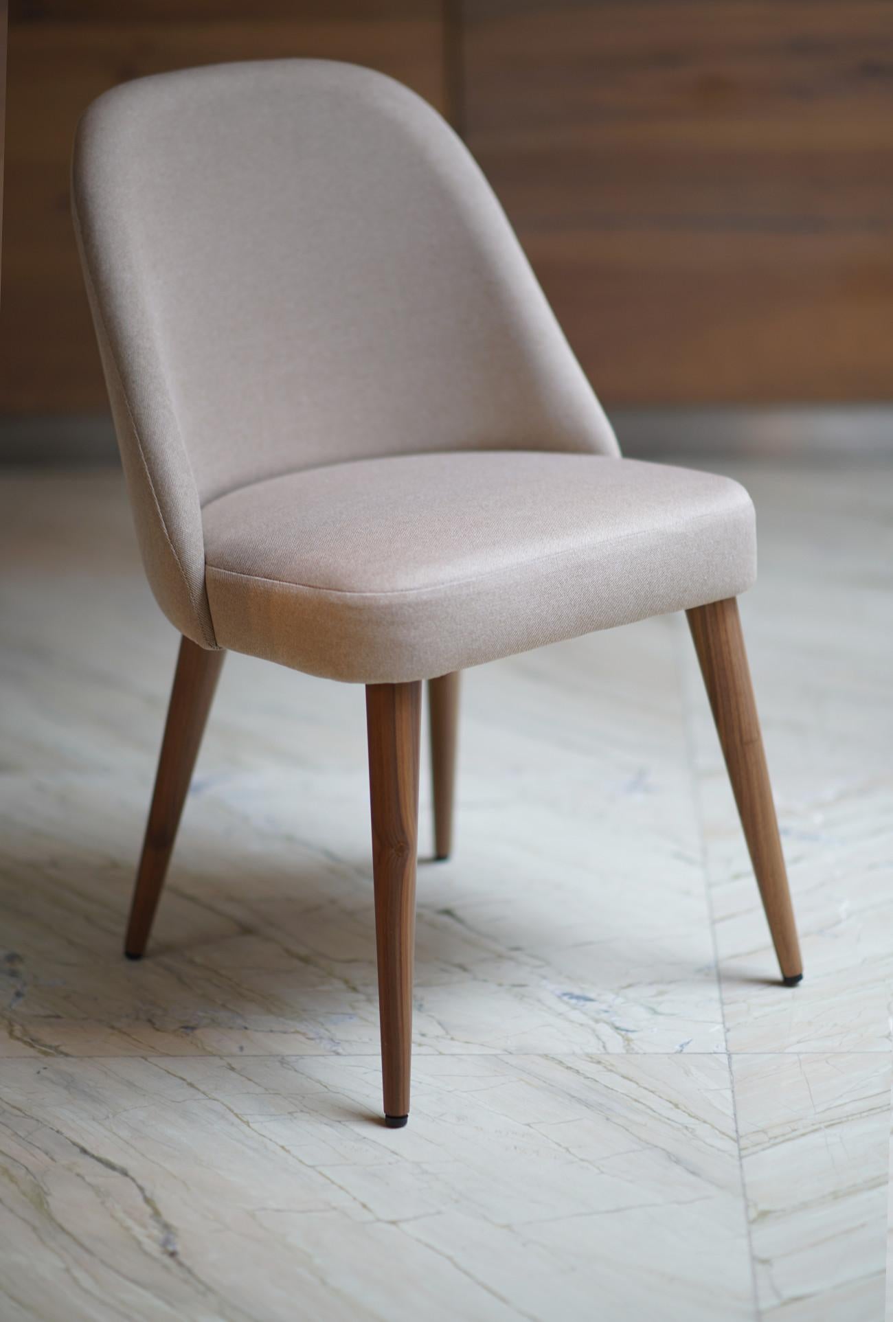 Helsinki collection. Helsinki chair: simple, elegant, comfortable. Available in oak and walnut base or in custom materials, may be upholstered with variety of fabrics and colors.

Our clients´ favorite collection is based on a piece that is as