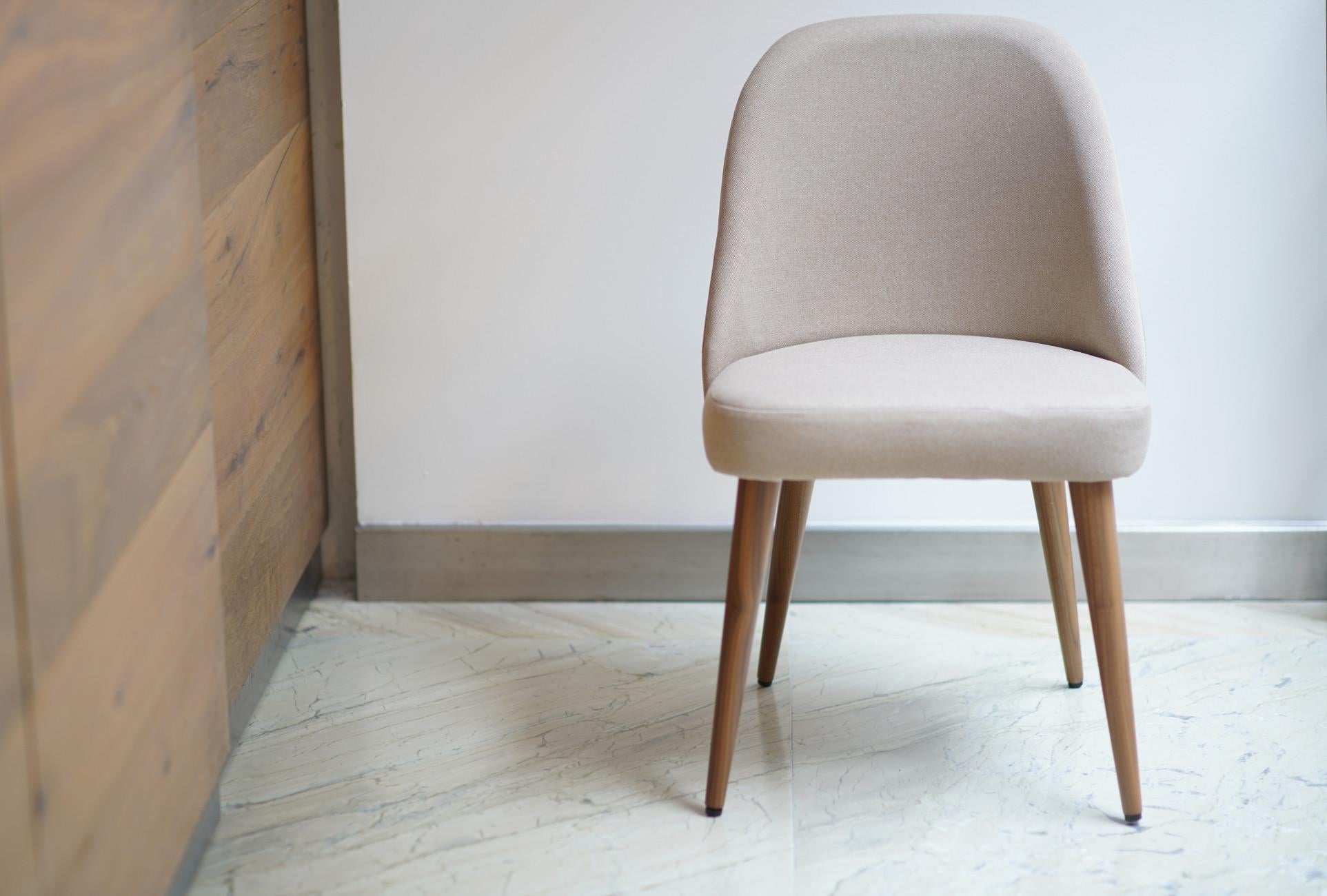 beige leather dining chair