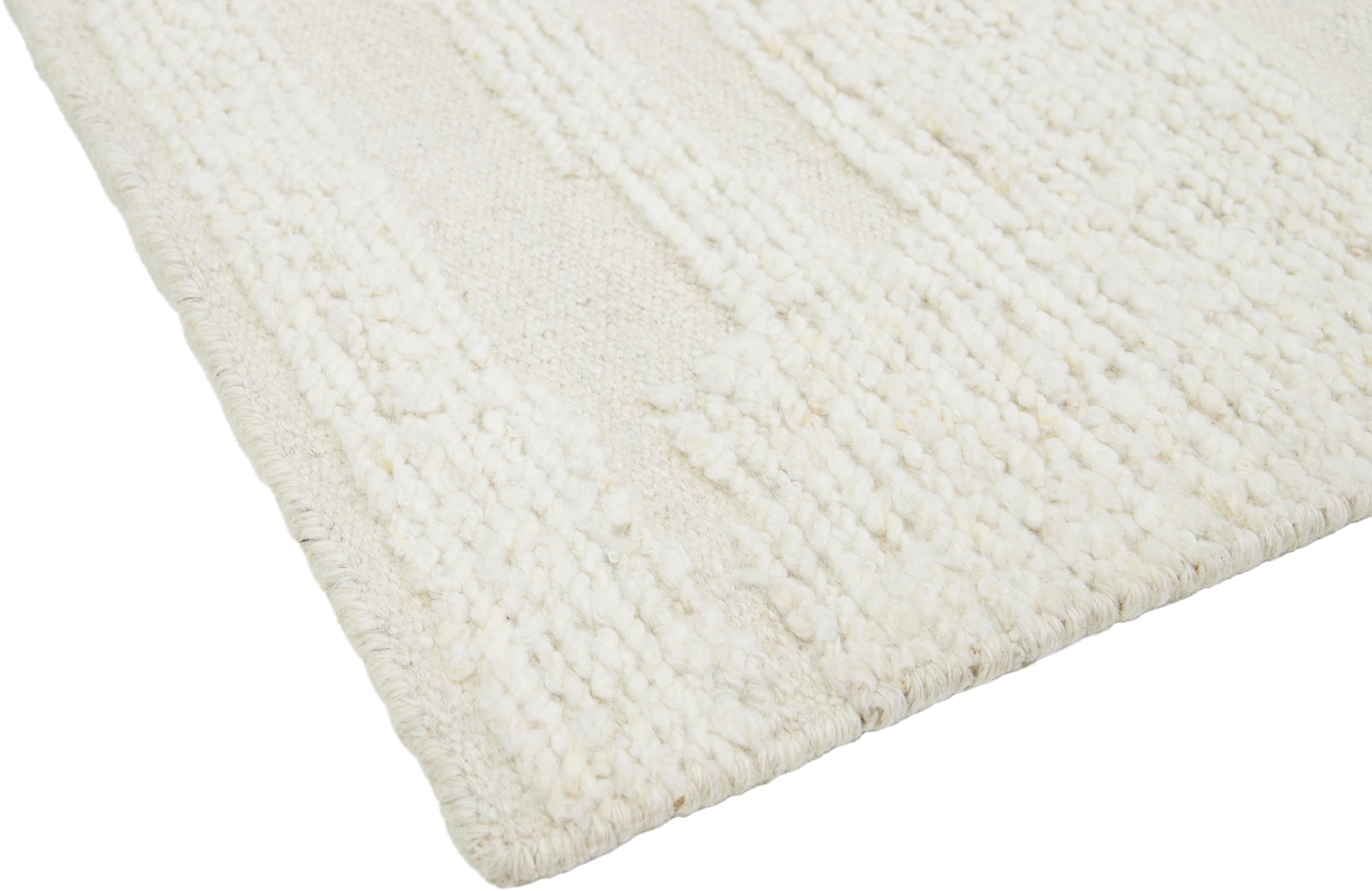 The Modern Moroccan Custom Rug offers customizable sizing and color options. Hand-knotted using Wool, it exudes superior quality and durability. Sourced from India, it has a lead time of 15-20 weeks.

The price is based on an 8' x 10'.

