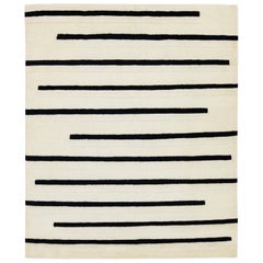 Tappeto moderno in lana in stile marocchino avorio con disegno a righe