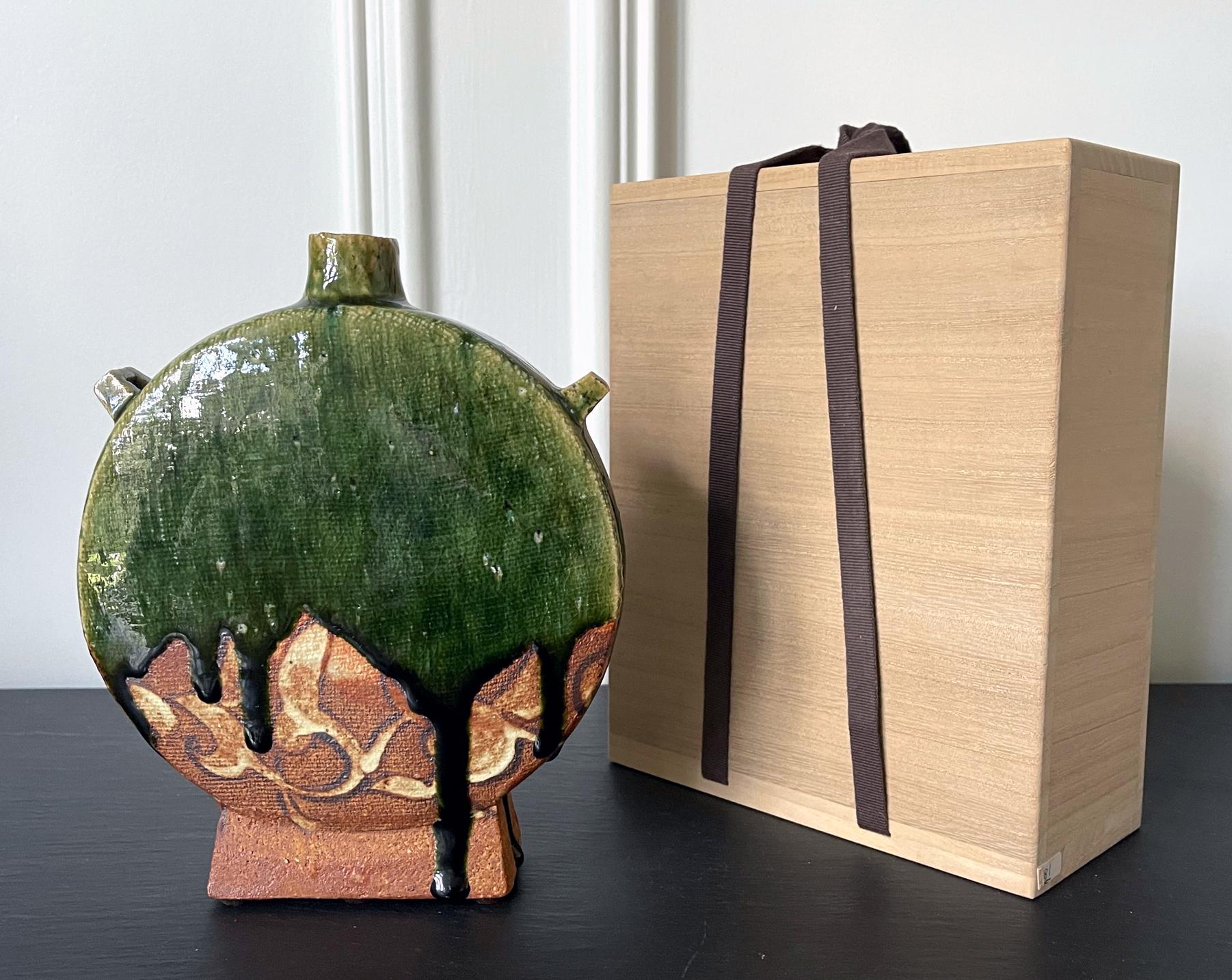 A contemporary studio ceramic vase made by Japanese potter Ken Matsuzaki (1950-). The vase showcases distinguished 