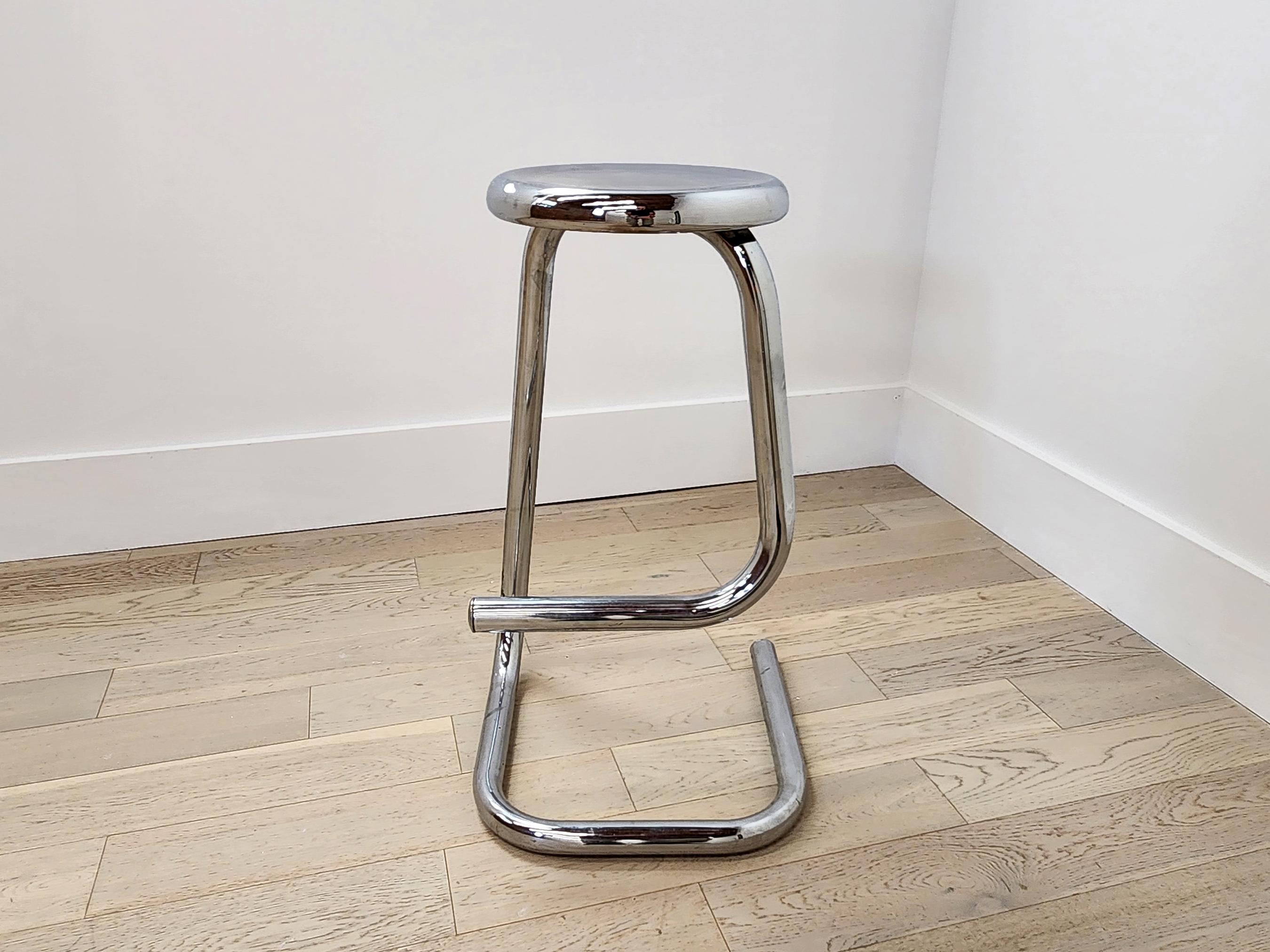 A simple and beautiful design built using a continuous piece of tubular steel that is bent to form a cantilevered base and solid footrest. The resulting bent paperclip form is purposeful and unique.

Created by Canadian designer Hugh Hamilton and