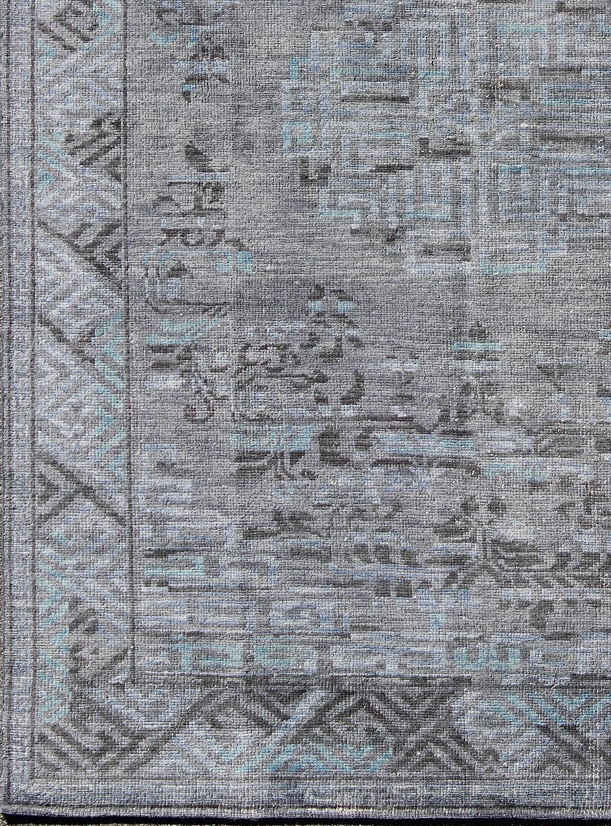 Indian Modern Khotan with Medallion Design in Warm Gray, Brown, Blue and Charcoal For Sale