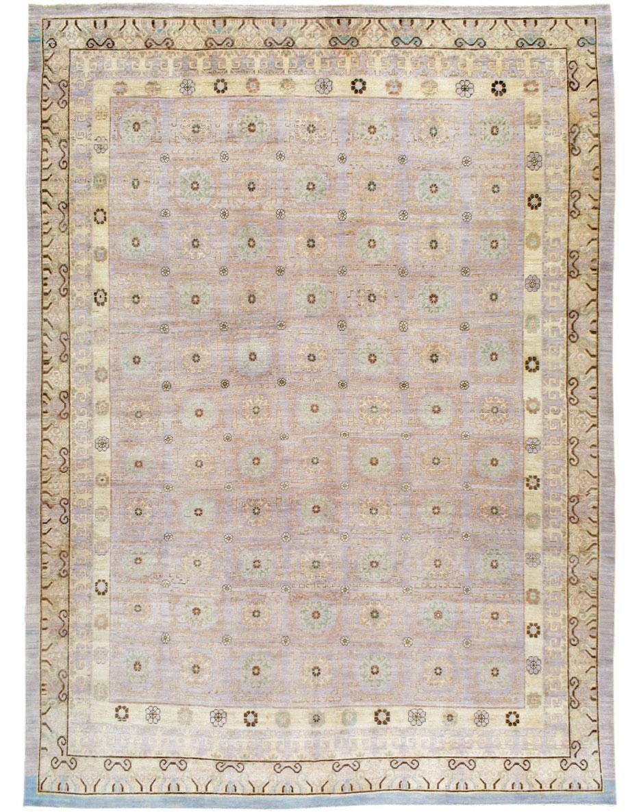 A contemporary Khotan style carpet from the fourth quarter of the 20th century. Woven with repurposed wool from vintage rugs to maintain a venerable charm.