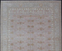 Modern Khotan Rug in Faded Rose and Soft Beige with Pale Blue and Gold Accents