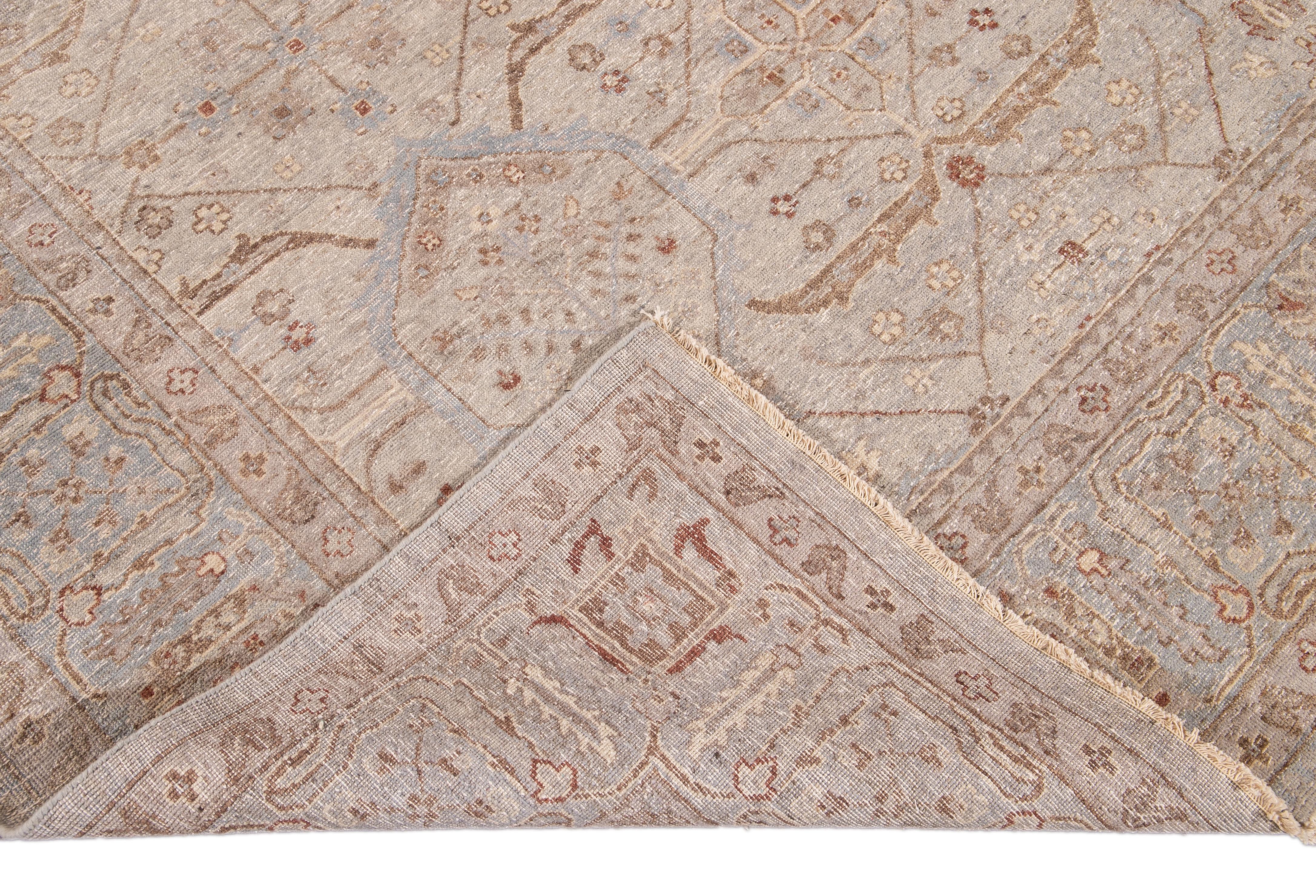 Beautiful modern square Khotan-style hand-knotted wool rug beige field. This Khotan-style rug has a blue frame and accent of blue, beige, and brown in a gorgeous all-over geometric floral design.

This rug measures: 10' x 10'2