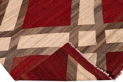 Moderner moderner Flachgewebter roter und beigefarbener geometrischer Wollteppich