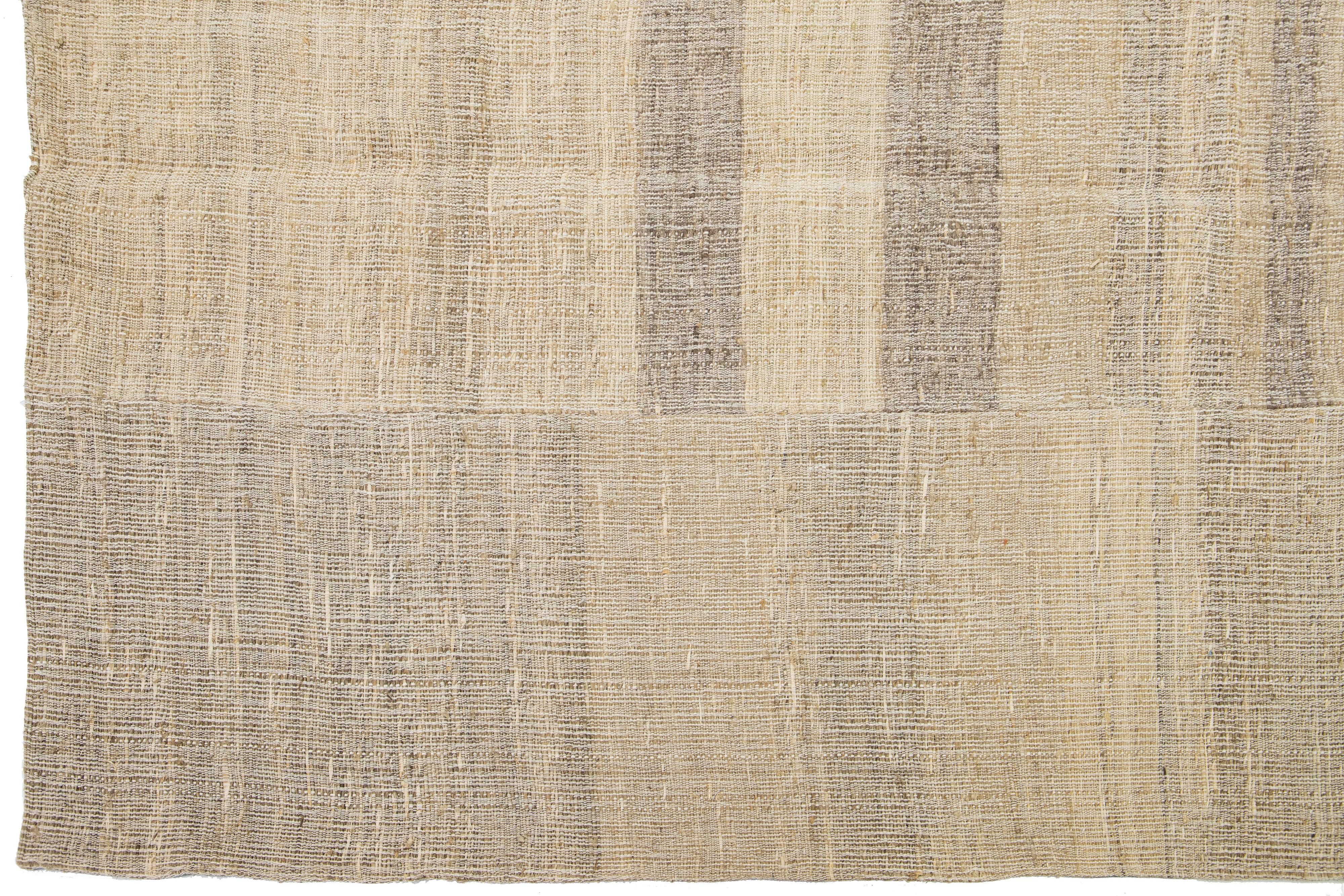 Hand-Knotted Modern kilim flatweave wool rug with Beige Field  For Sale
