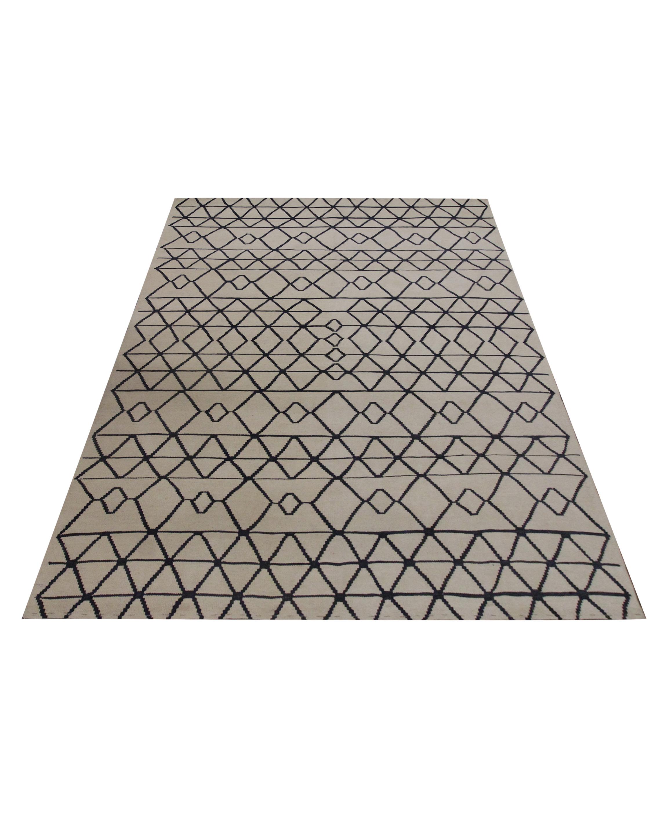 This fine wool Kilim is a New Modern Afghan area rug woven with a simple colour palette of cream and black. The black accents make up the symmetrical geometric pattern, creating a bold eye-catching rug. Similar to Scandinavian design this carpet is