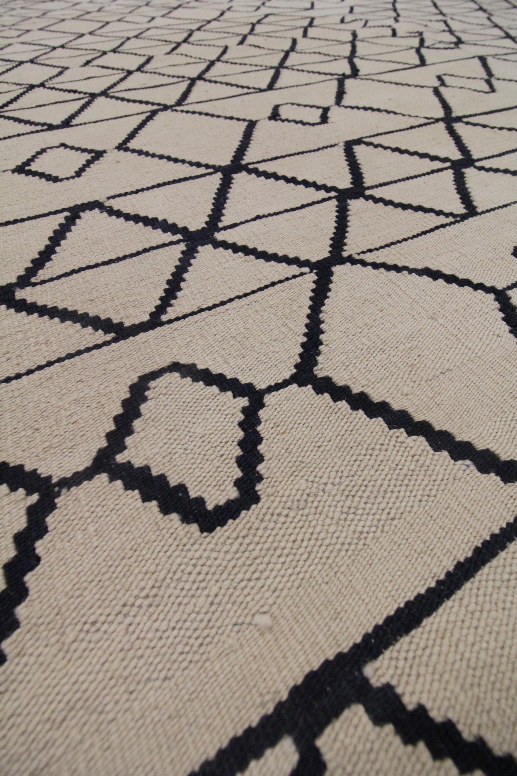 black and cream abstract rug