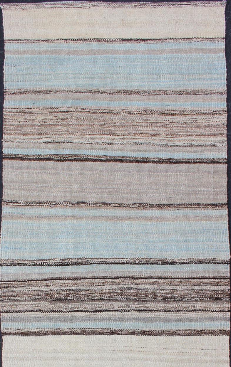 Flat-weave Kilim rug with stripes with modern design in shades of blue, taupe, brown and cream, rug AFG-27745, Keivan Woven Arts / country of origin / type: Afghanistan / Kilim

This playful piece features a Classic stripe design that evokes
