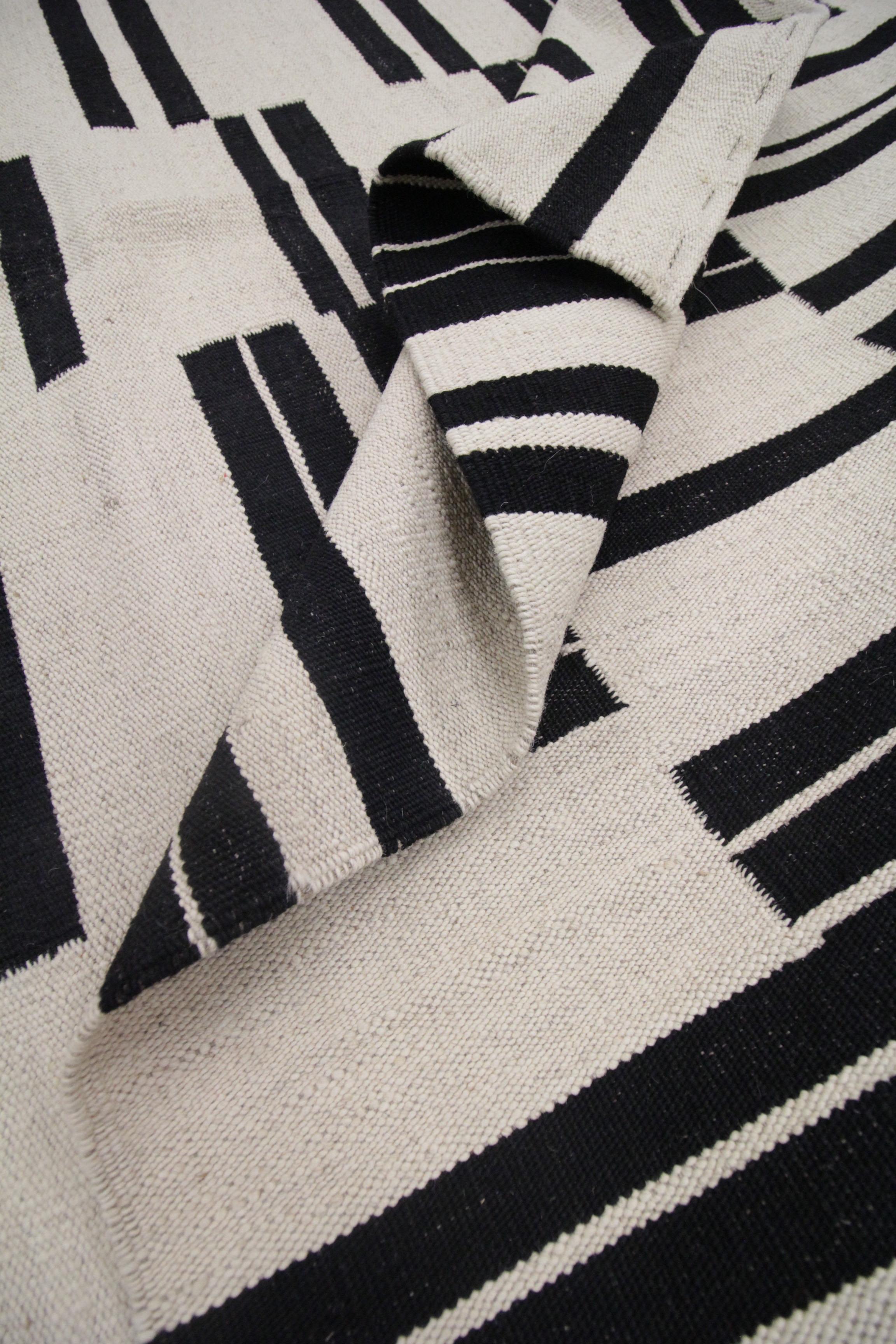 black and cream wool rug