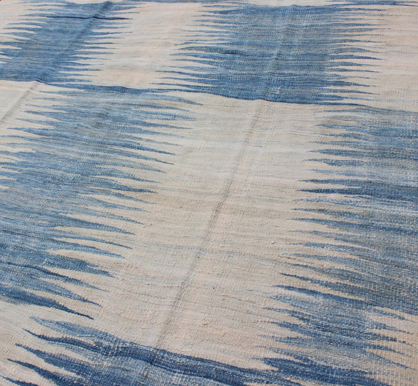 Measures: 6'4 x 9'5
Modern Kilim Tribal Rug With Abstract Geometric Design in Soft Blues 6'4 X 9'5. Keivan Woven Arts / rug/ AFG-13526, country of origin / type: Afghanistan / Kilim, circa 21st Century.

The Contemporary Modern Kilim Tribal Rug