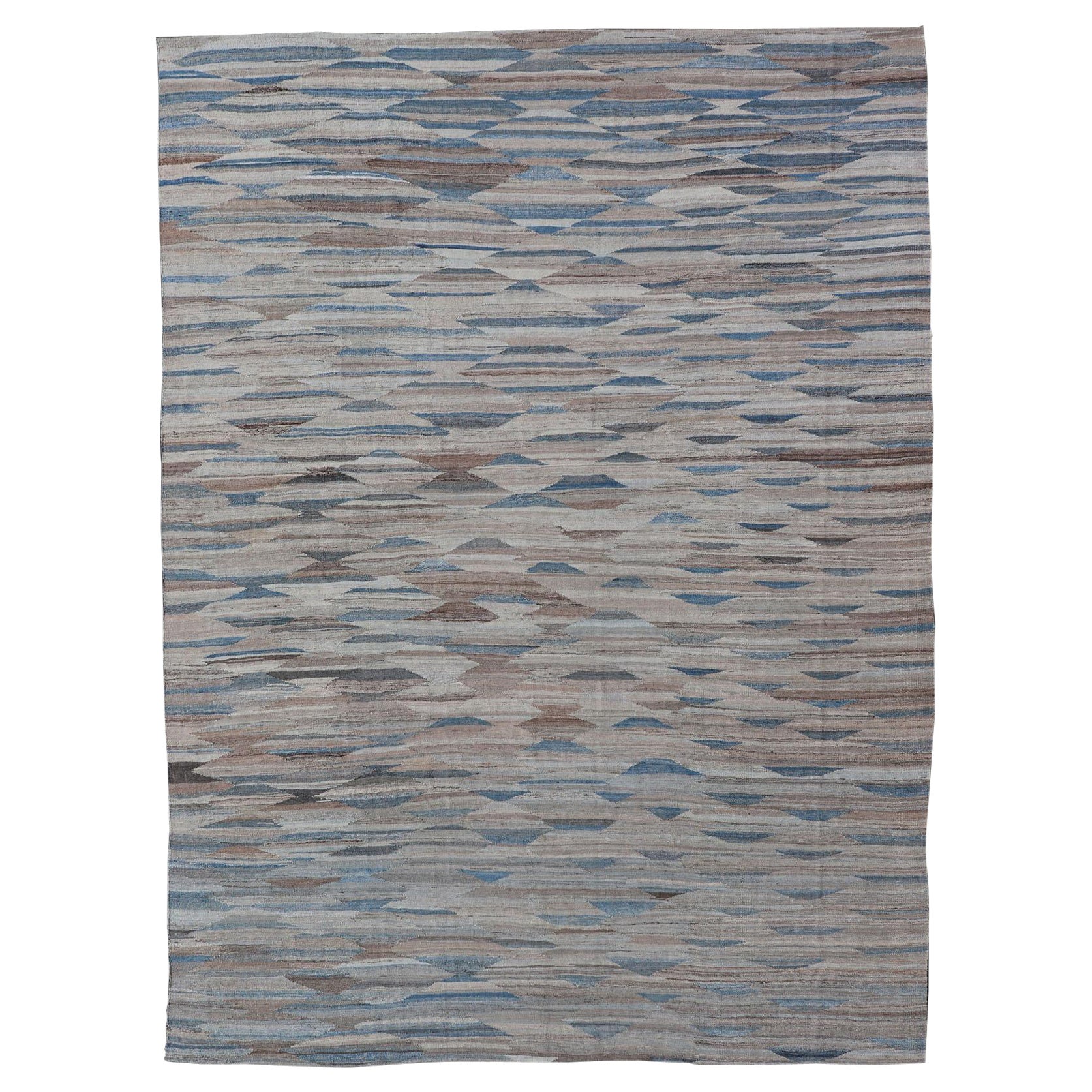 Kilim moderno con geometrie in  Variazione di toni blu, marrone, marrone scuro e neutro