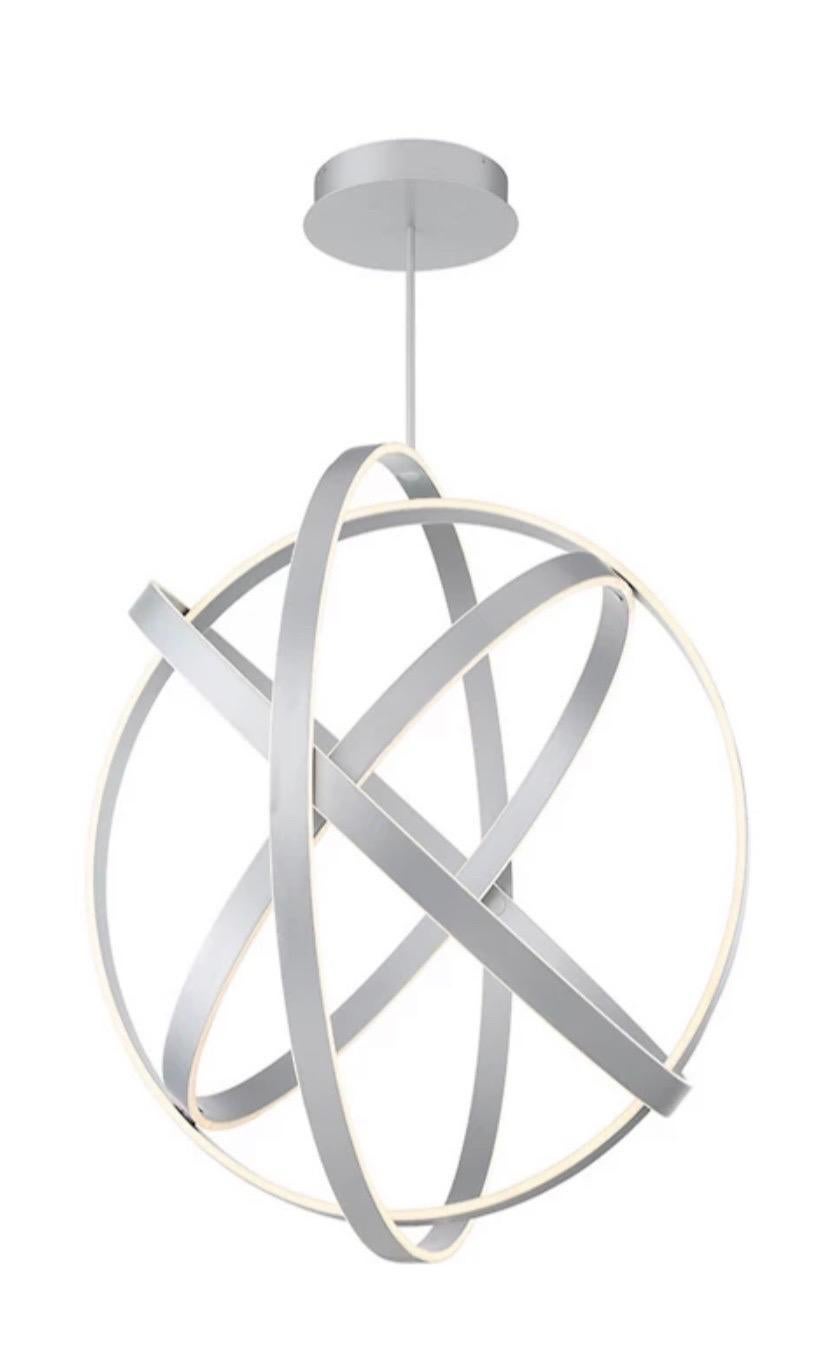 The Kinetic Pendant by Modern Forms is an artful blend of motion and light. Its gyroscope-inspired body (made of Solid Titanium) contains several rings that are adjustable and side lit with integrated LED sources. The resulting ambiance is both