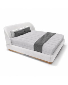 Cama King moderna en nogal y tela blanca