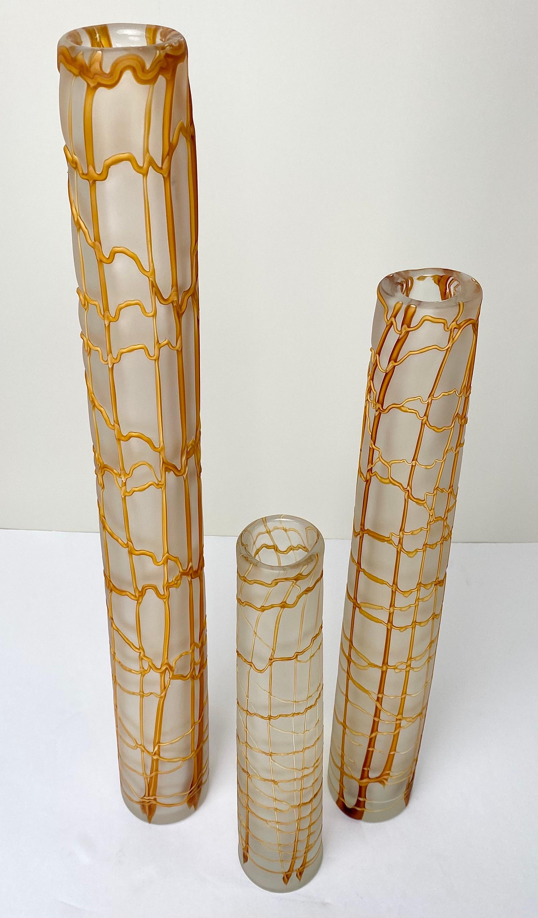 A trio of Modern Kintsugi-style skinny vases, each a unique embodiment of artistry and contemporary design. Crafted in three dimensions—tall, medium, and small—these vases are a testament to the seamless fusion of traditional Kintsugi aesthetics and