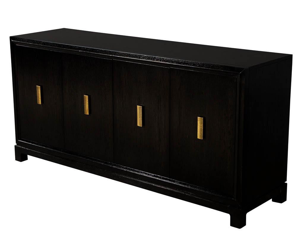 Modern lacquered oak sideboard buffet. Featuring a dark espresso finish with modern stylish brass hardware.
Price includes complimentary curb side delivery to the continental USA.