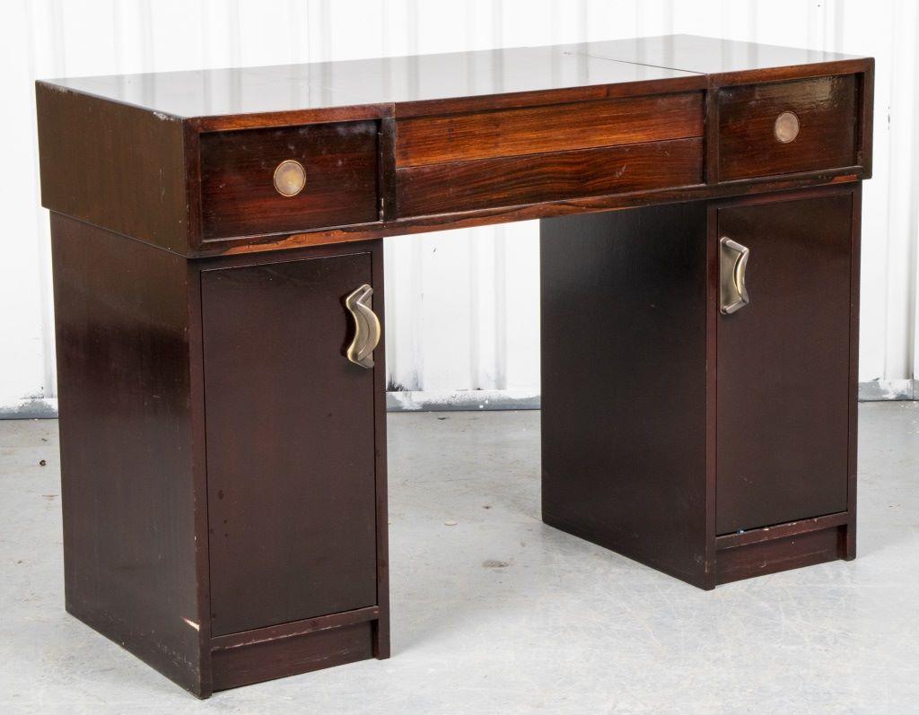 Modern lacquered wood vanity desk with convertible writing compartment, in the Art Deco taste, the center flanked by two drawers and two doors.