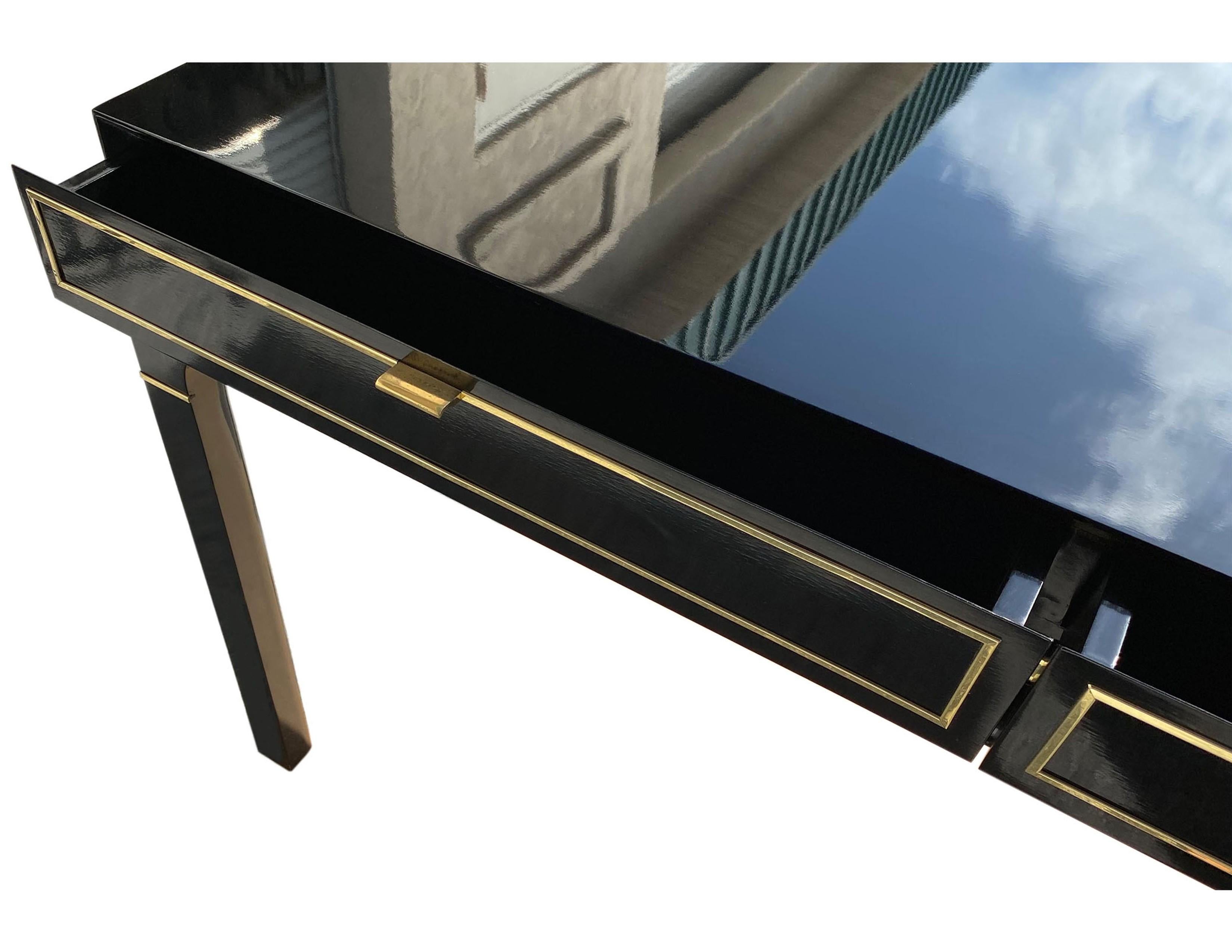 Mid-20th Century Modern Lacquered Writing Desk with Brass Accents by John Stuart For Sale