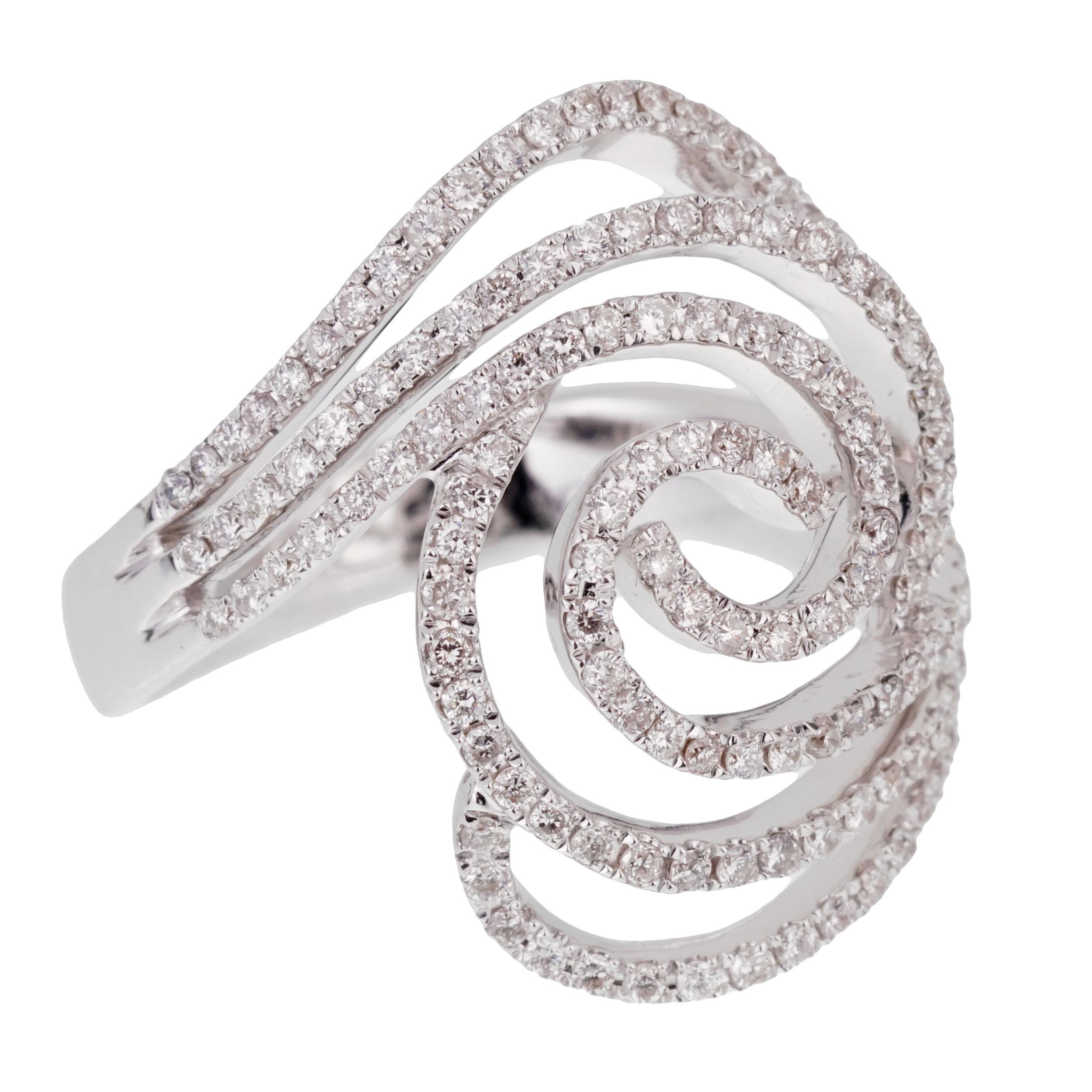 A fabulous ladies diamond cocktail ring featuring a circular pattern adorned with round brilliant cut diamonds in 18k white gold.

The ring measures a size 6 1/2 and can be resized