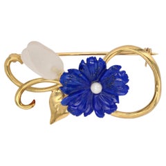 Moderna spilla a fiore in oro giallo 18 K.K. con perla coltivata di lapislazzuli