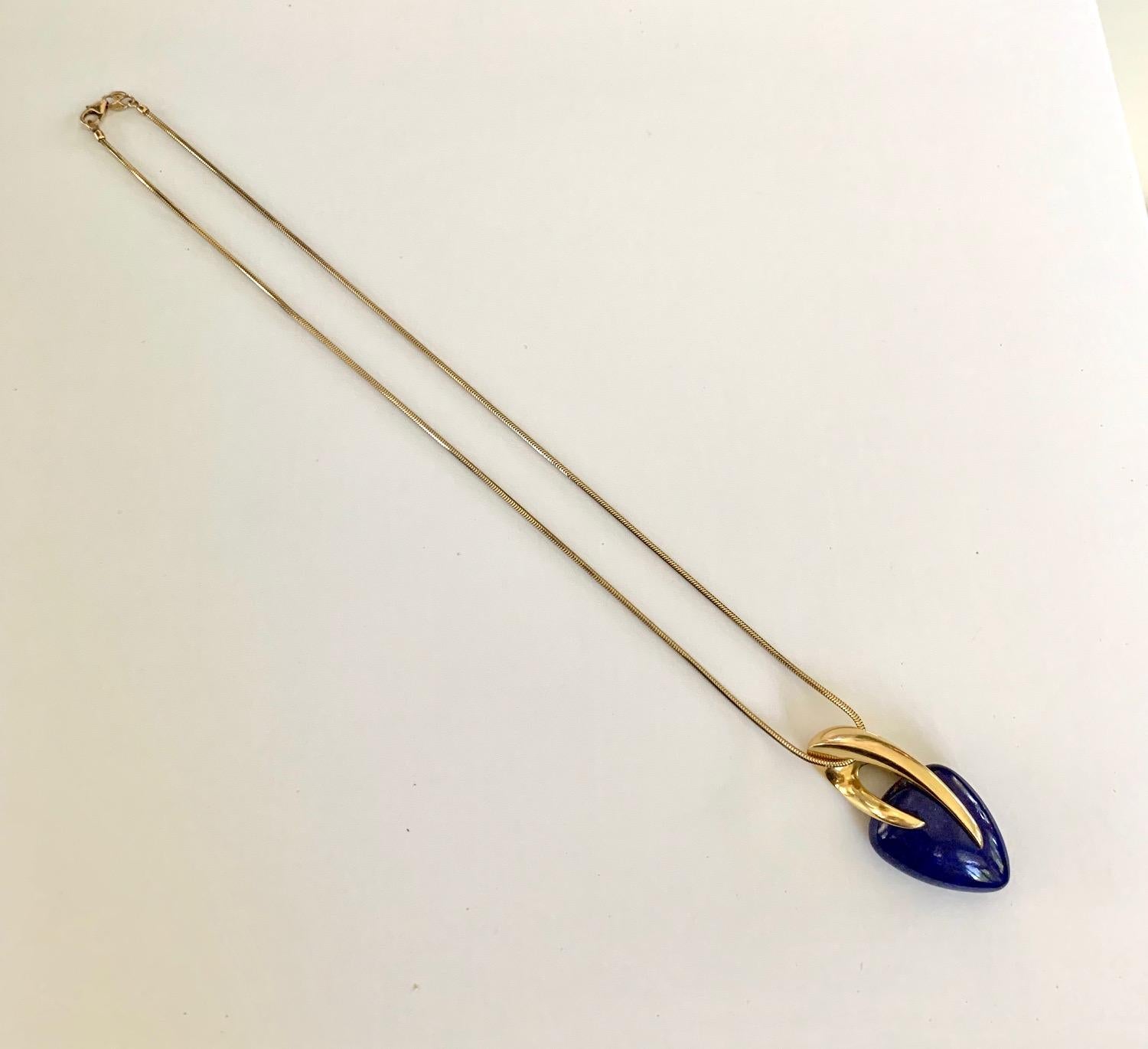 Modern Kria Lapis Lazuli in 18 Karat Yellow Gold Setting and 18 Karat Snake Chain