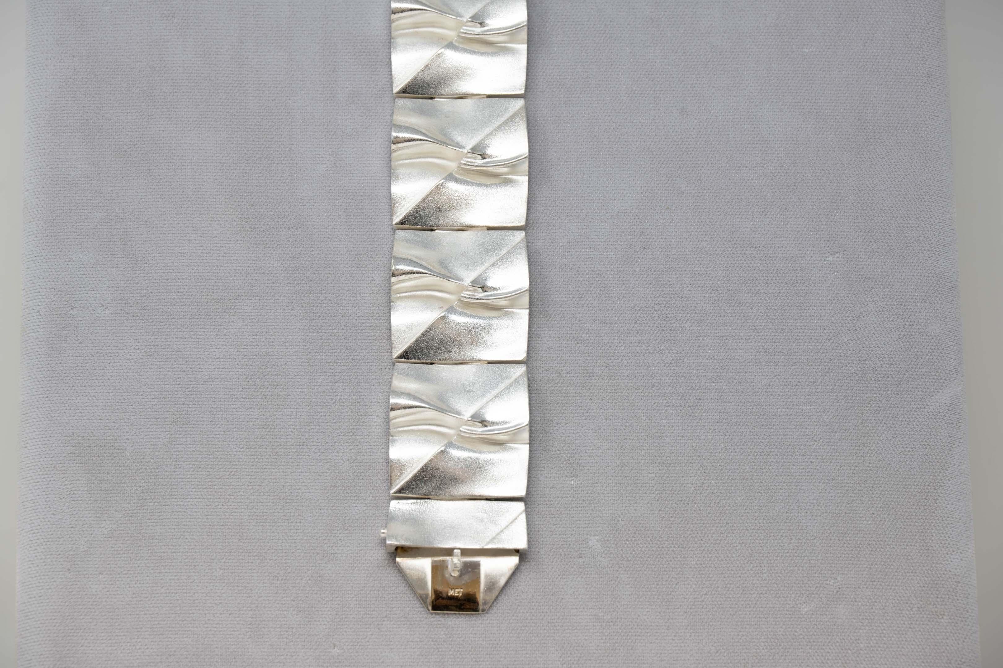 Modern Lapponia sterling silver bracelet designed by Bjorn Weckstrom in Finland. Stamped on the back, in good condition, measures 7.5 inches long x 1.5 inches wide,
